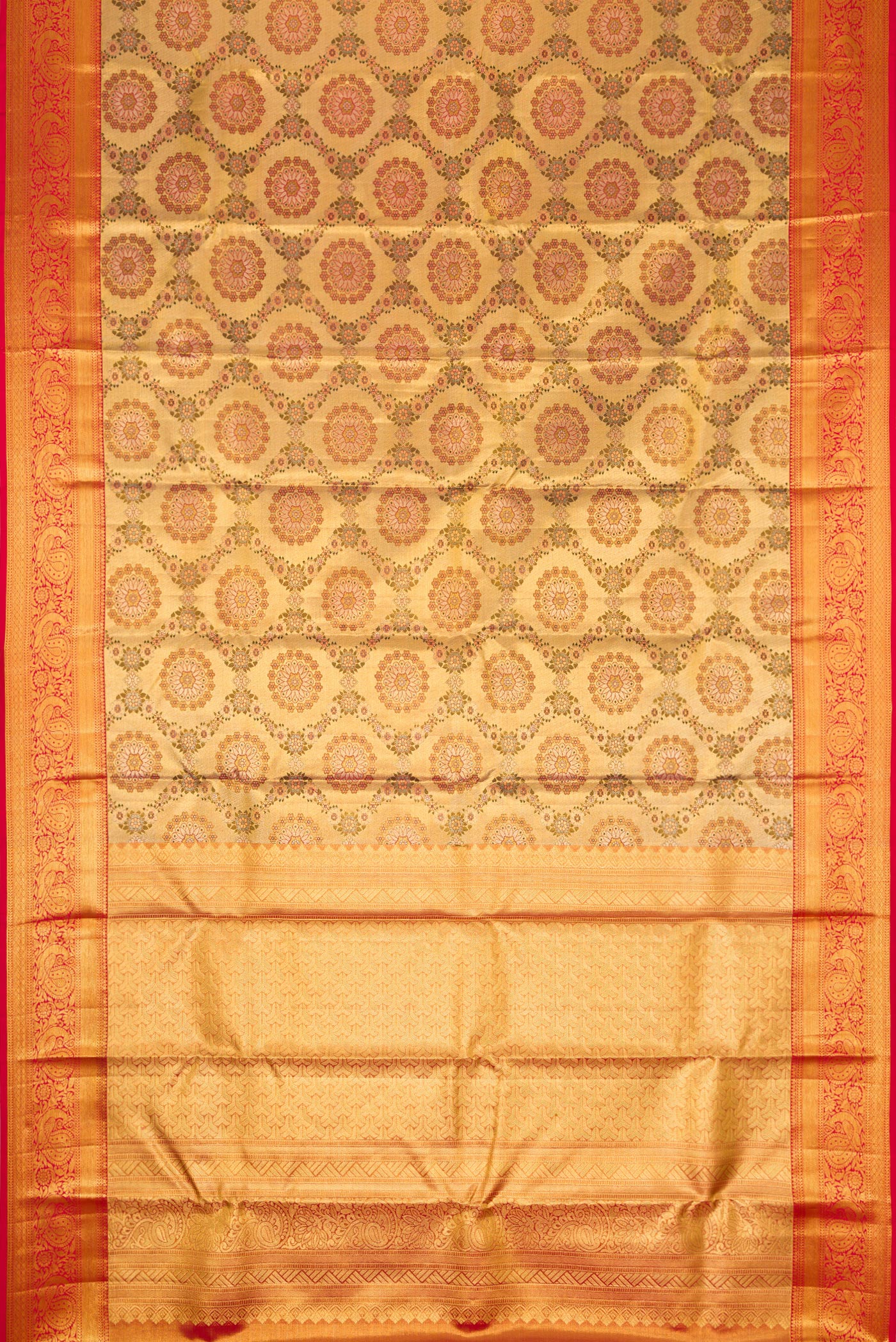 Flat view of Gold Dual Tone Kanjivaram Tissue Silk Saree with Zari Brocade on the body and Zari Border. 