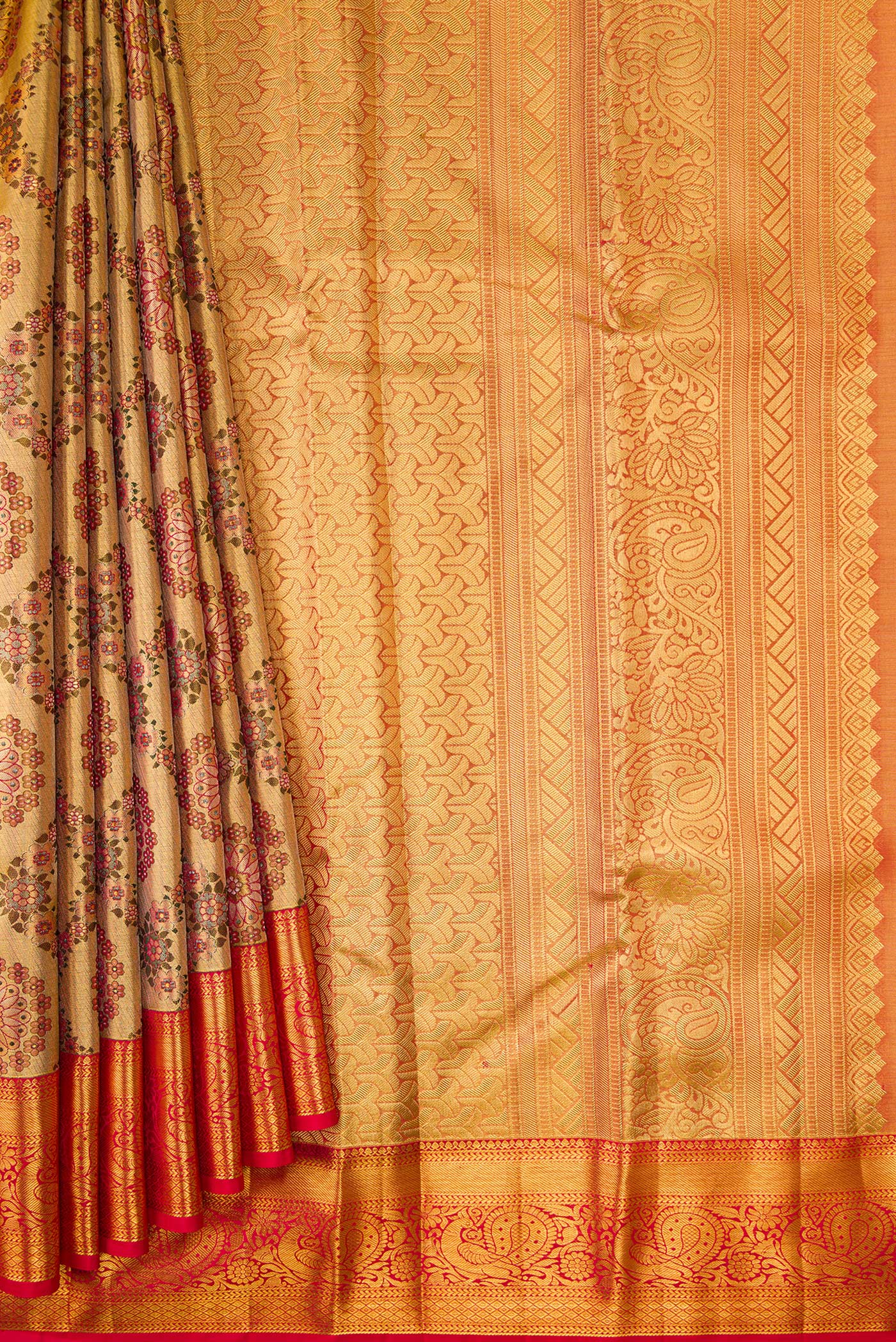 Pleats and pallu of Gold Dual Tone Kanjivaram Tissue Silk Saree with Zari Brocade on the body and Zari Border. 