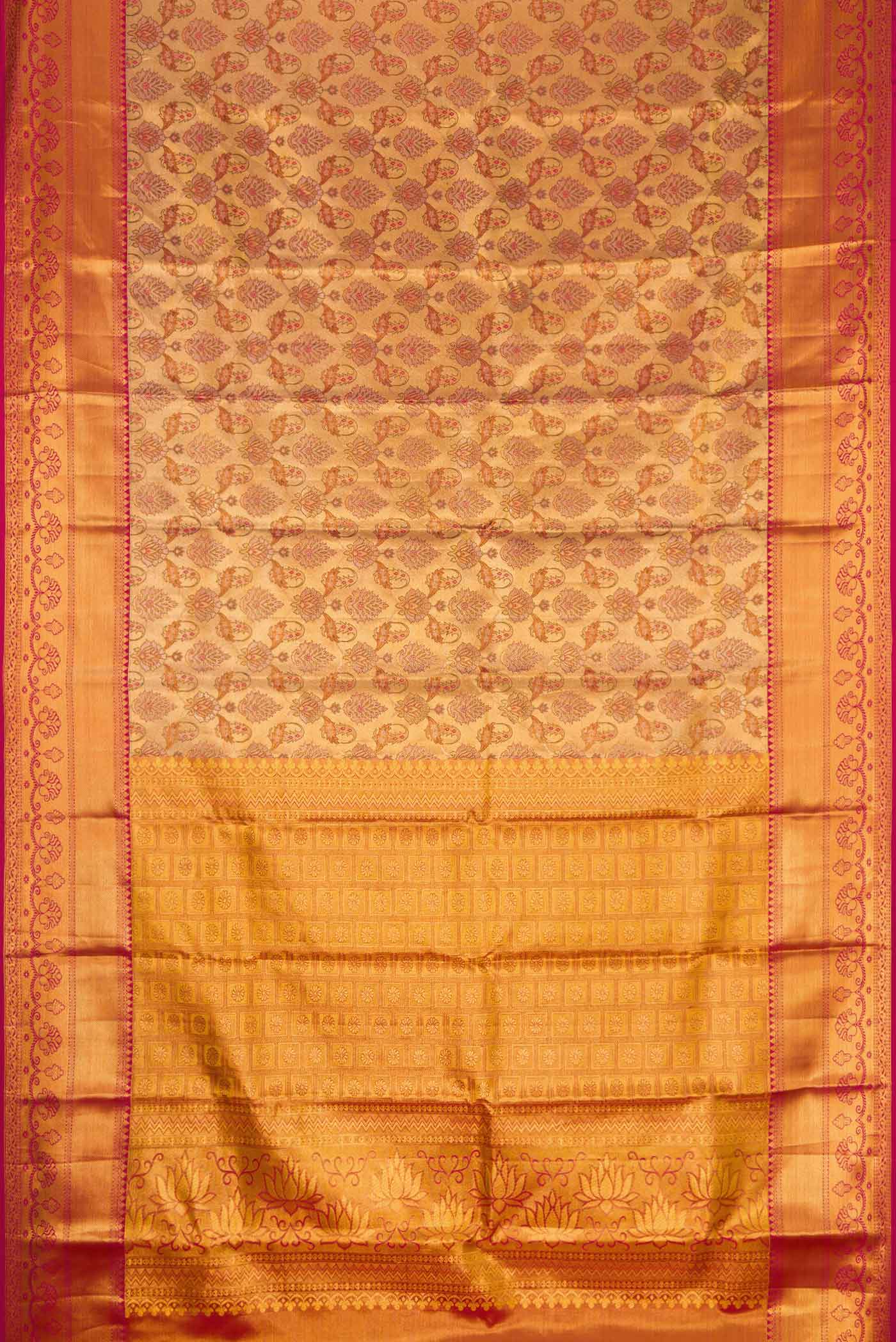 Flat view of Gold Dual Tone Kanjivaram Tissue Silk Saree with Zari Brocade on the body and Zari Border. 