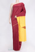 Maroon Dual Tone Raw Silk Saree with Checked design on the body and Thin Zari Line.  displayed on a mannequin