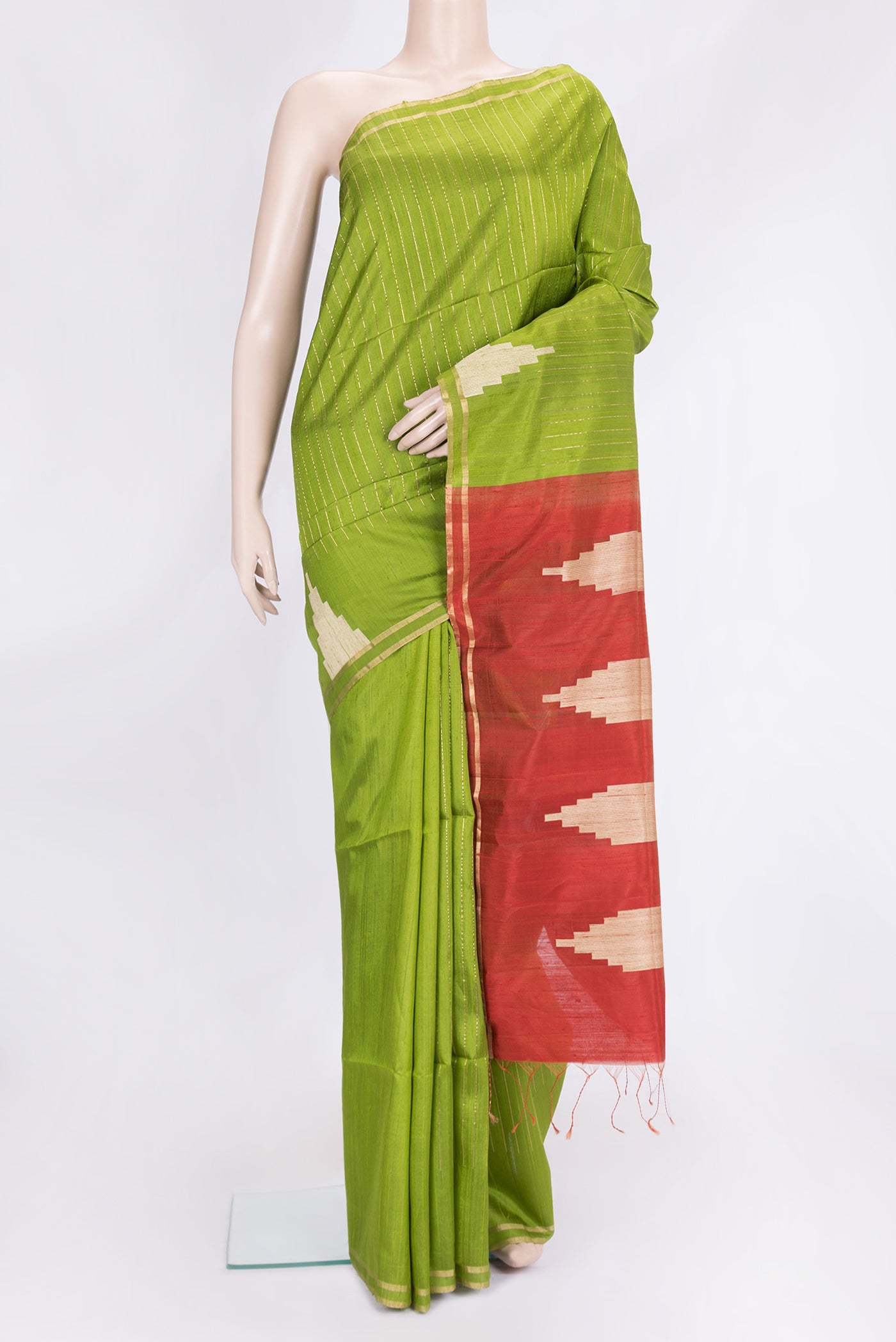 Green Dual Tone Raw Silk Saree with Stripes on the body and Temple Border.  displayed on a mannequin