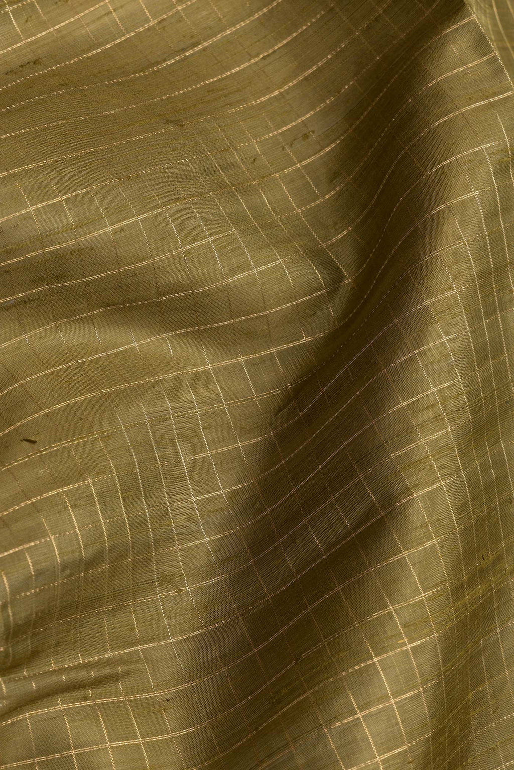 Close up of Mehandi Green Dual Tone Raw Silk Saree with Checked design on the body and Zari Border.  displaying folds