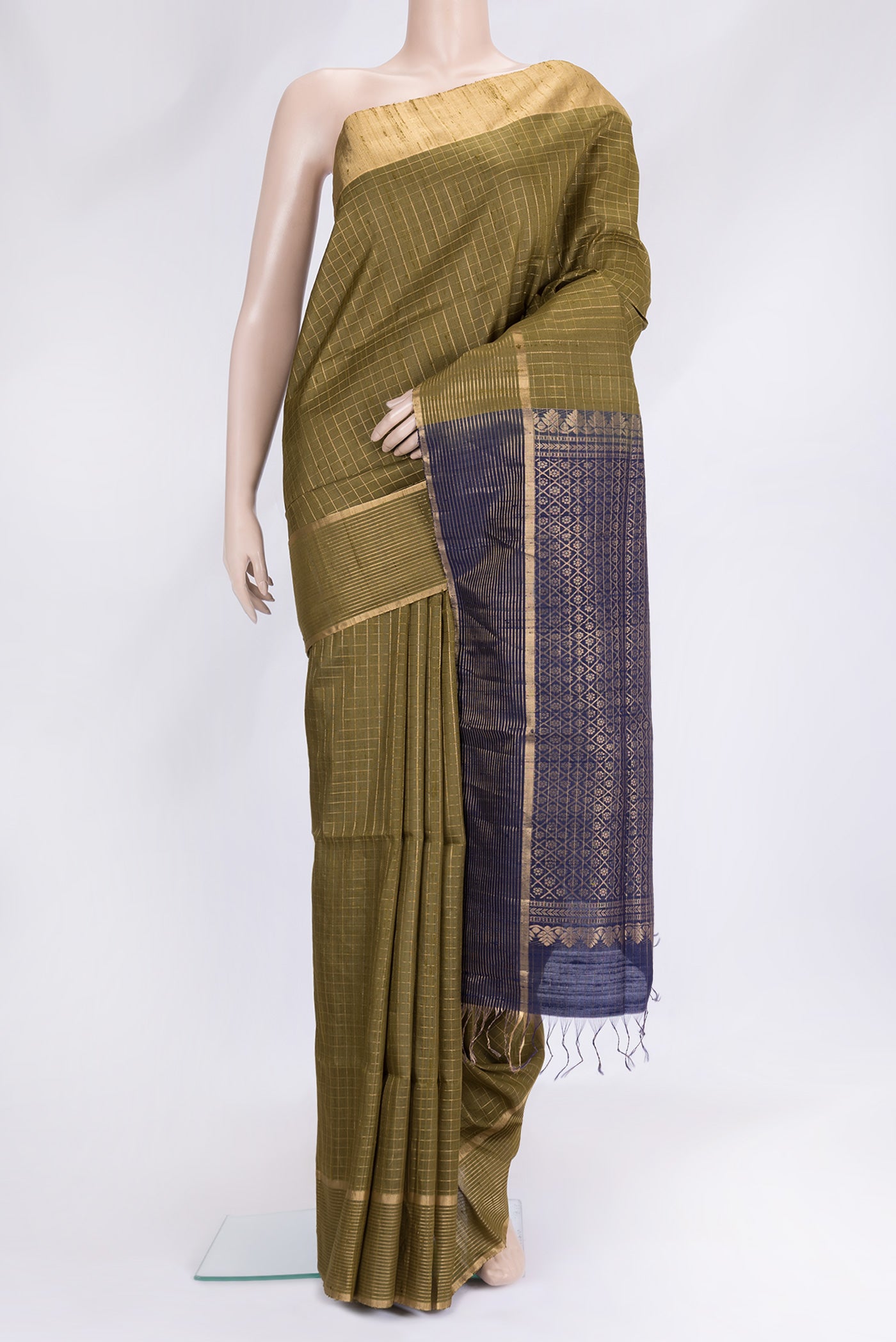 Mehandi Green Dual Tone Raw Silk Saree with Checked design on the body and Zari Border.  displayed on a mannequin