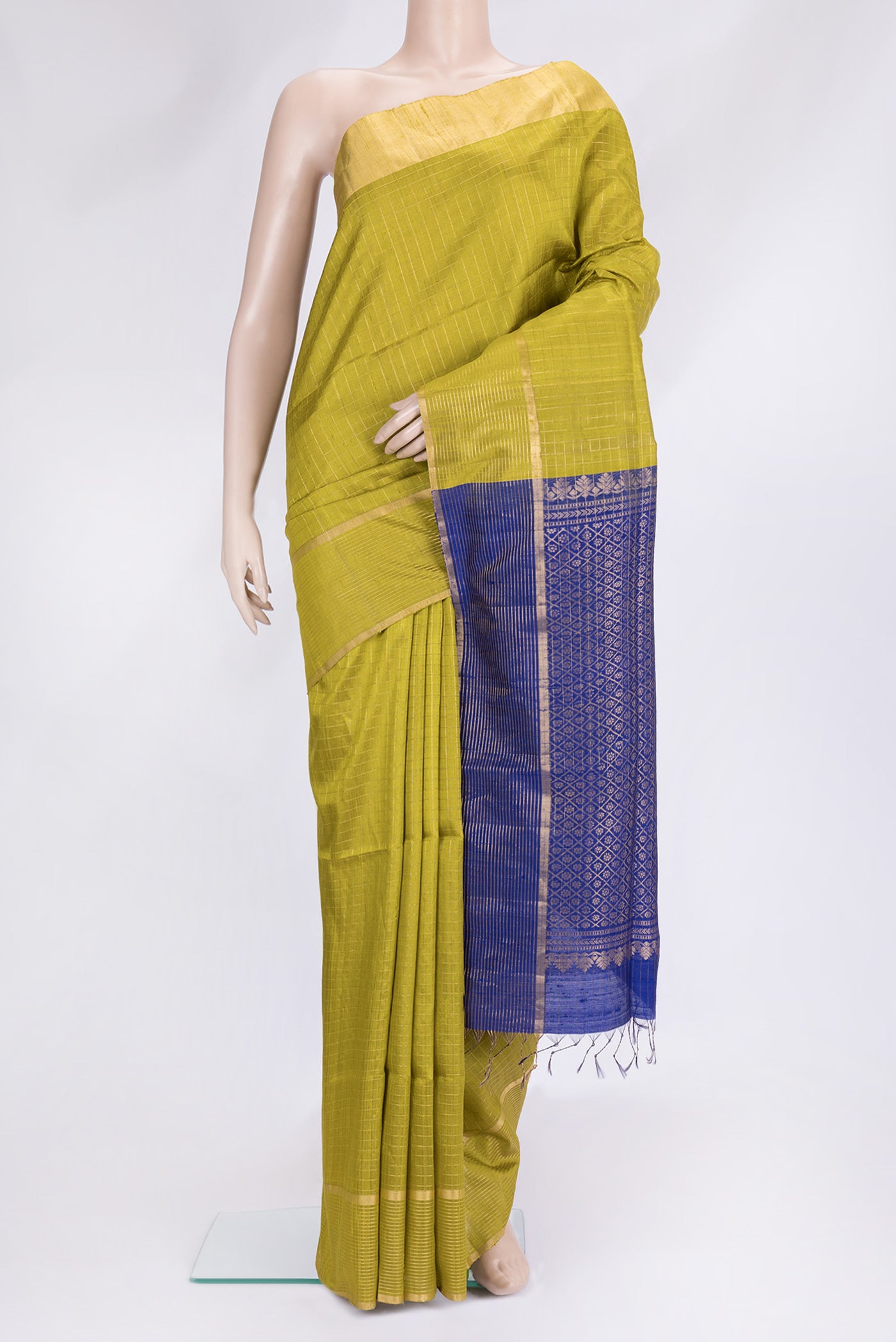 Parrot Green Dual Tone Raw Silk Saree with Checked design on the body and Zari Border.  displayed on a mannequin