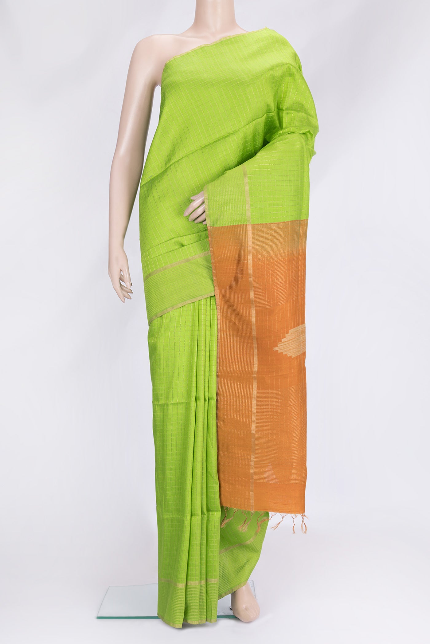 Pista Green Dual Tone Raw Silk Saree with Checked design on the body and Zari Border.  displayed on a mannequin