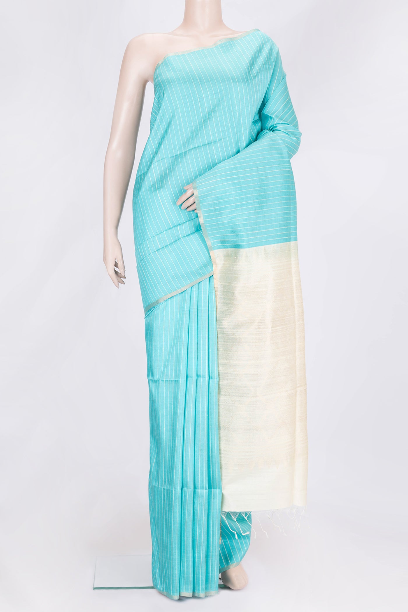 Sky Blue Dual Tone Raw Silk Saree with Stripes on the body and Thin Zari Line.  displayed on a mannequin