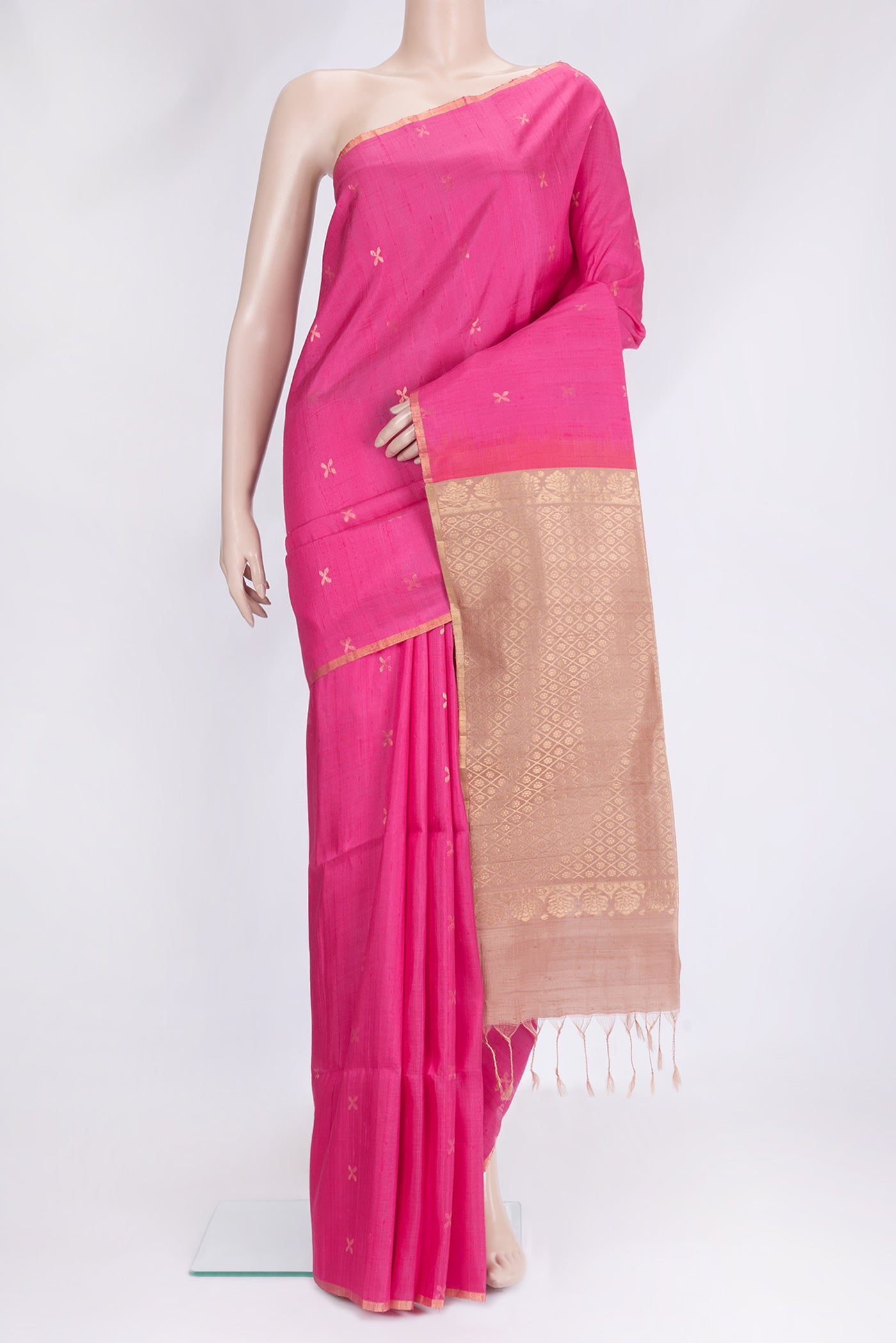 Pink Dual Tone Raw Silk Saree with Zari Butta on the body and Thin Zari Line.  displayed on a mannequin