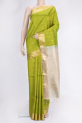 Parrot Green Dual Tone Raw Silk Saree with Zari Butta on the body and Zari Border.  displayed on a mannequin