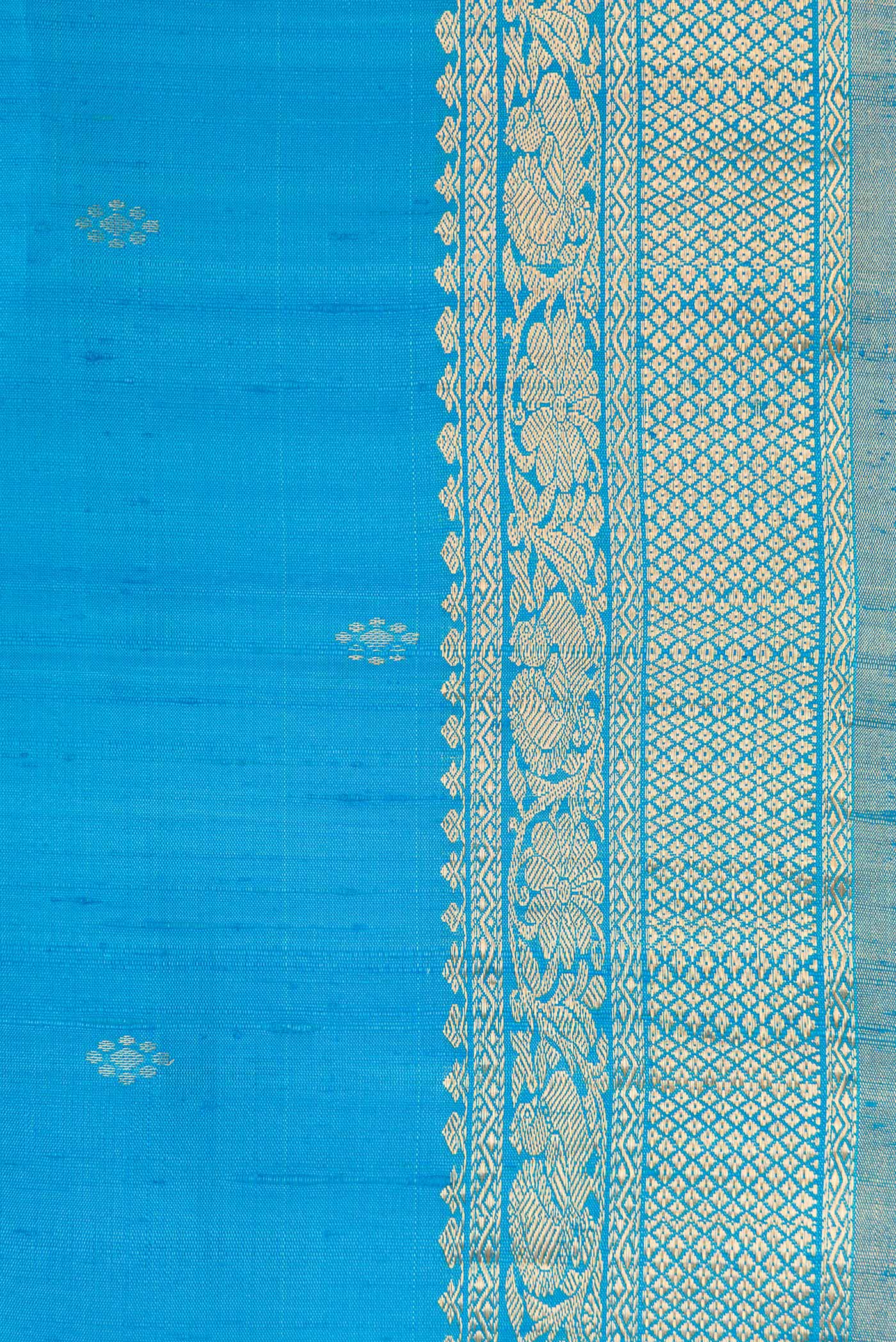 Border image of Sky Blue Dual Tone Raw Silk Saree with Zari Butta on the body and Zari Border. 