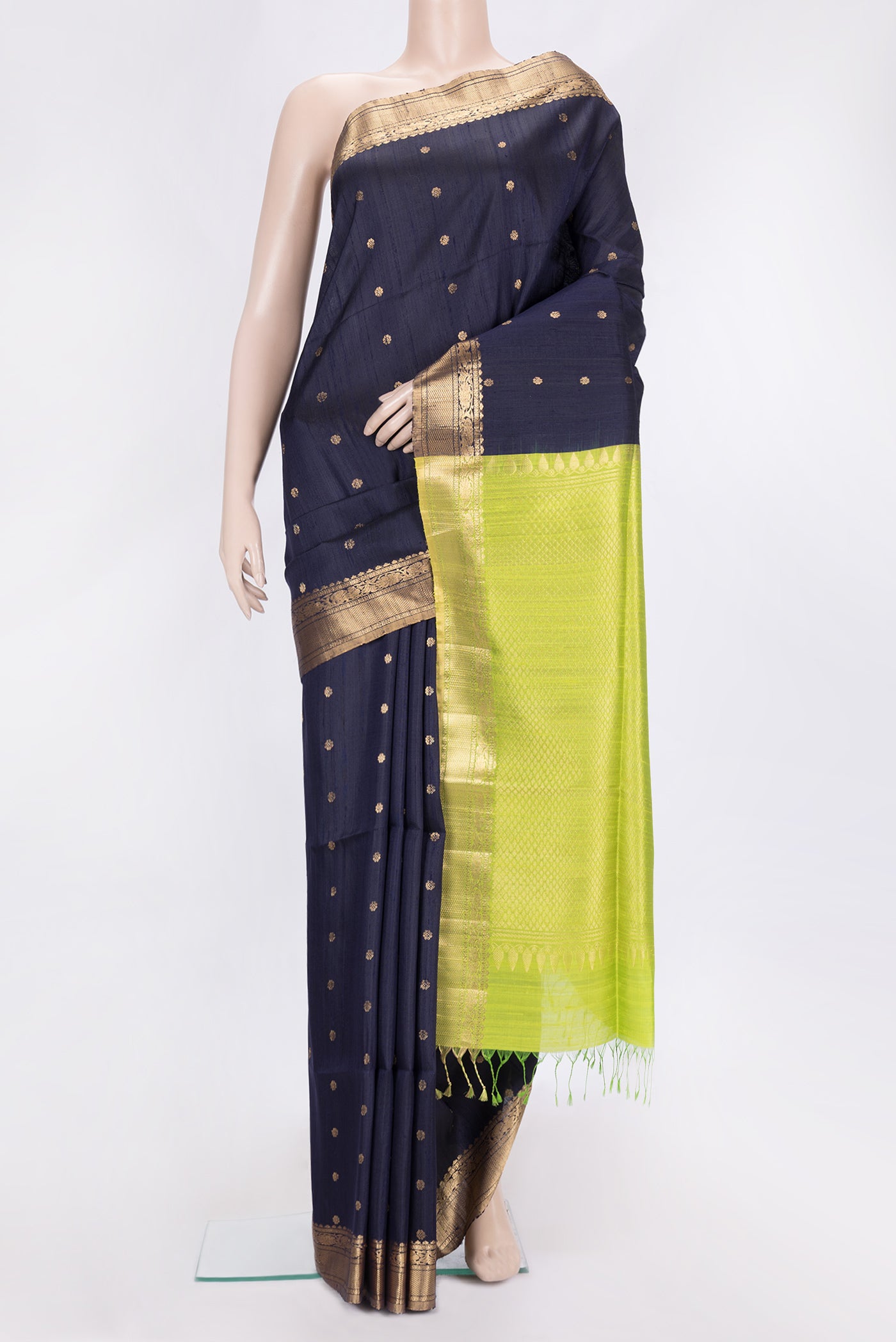 Navy Blue Dual Tone Raw Silk Saree with Zari Butta on the body and Zari Border.  displayed on a mannequin