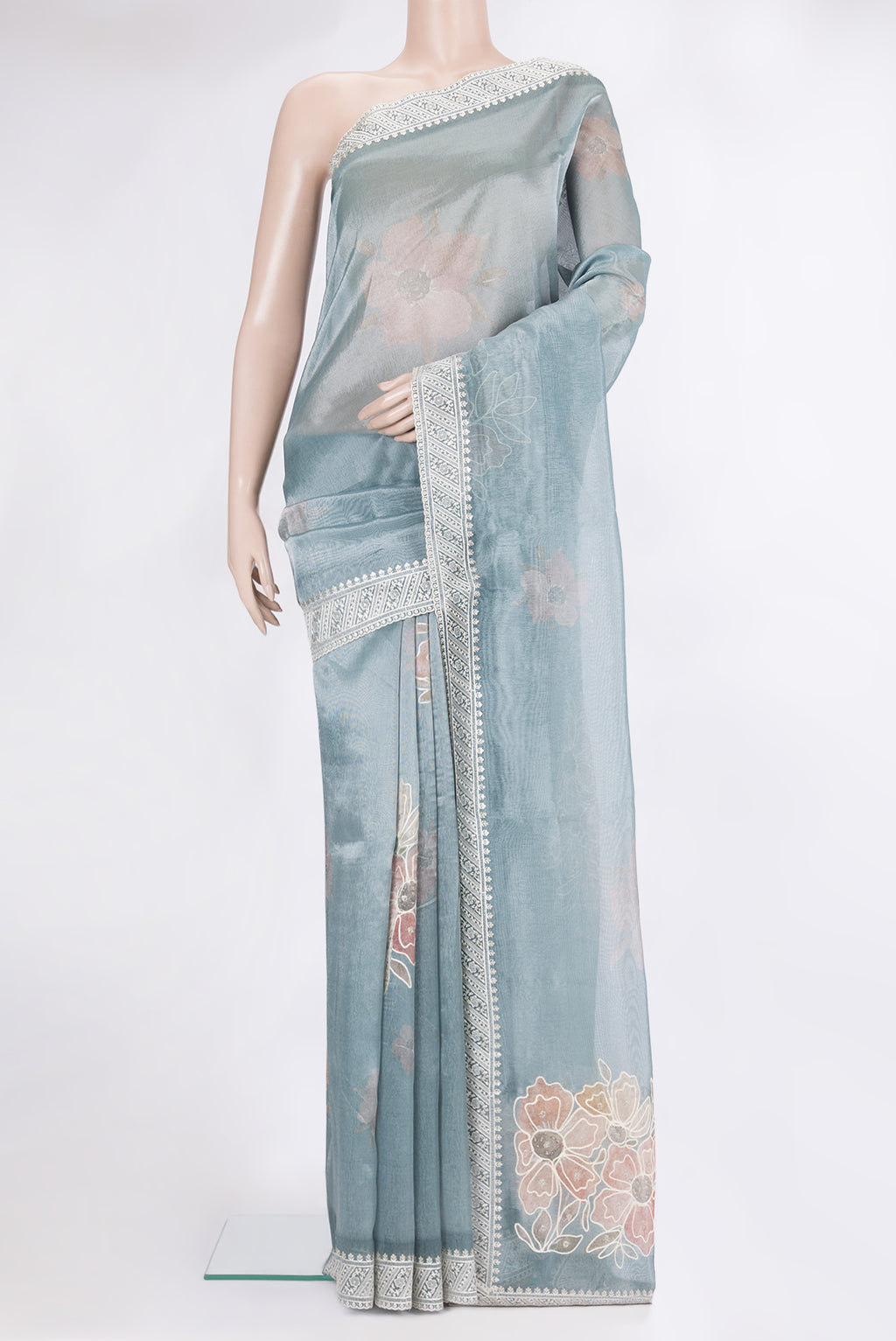 Light Blue Blended Organza Silk Saree with Zari Brocade on the body and Embroidery Border.  displayed on a mannequin