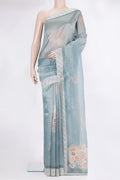 Light Blue Blended Organza Silk Saree with Zari Brocade on the body and Embroidery Border.  displayed on a mannequin