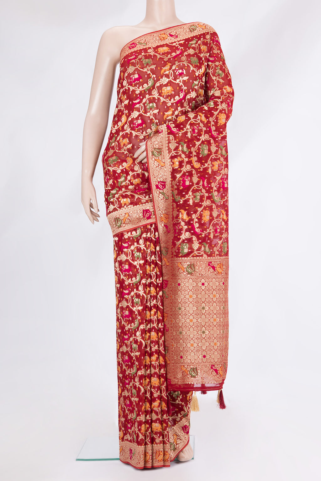 Red Blended Banarasi Silk Saree with Zari Brocade on the body and Fancy Border.  displayed on a mannequin