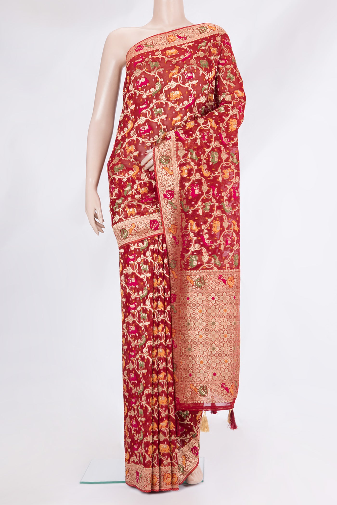 Red Blended Banarasi Silk Saree with Zari Brocade on the body and Fancy Border.  displayed on a mannequin
