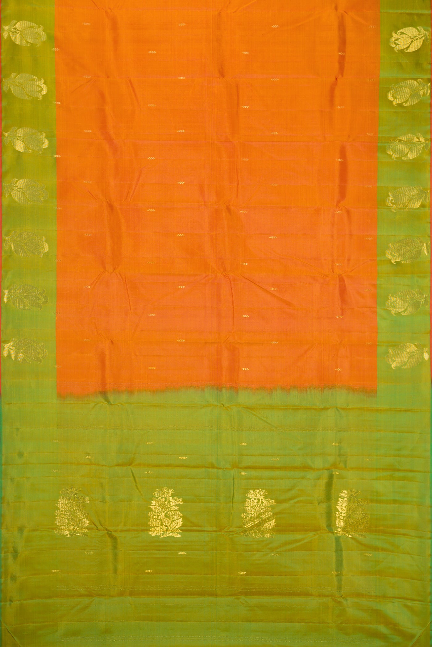 Flat view of Orange Dual Tone Soft Silk Saree with Zari Butta on the body and Zari Border. 