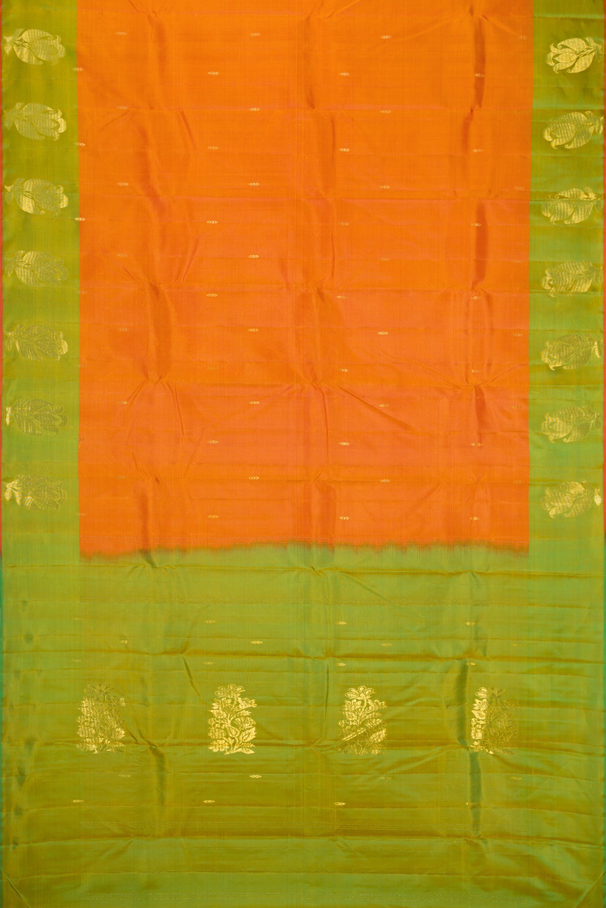 Flat view of Orange Dual Tone Soft Silk Saree with Zari Butta on the body and Zari Border. 