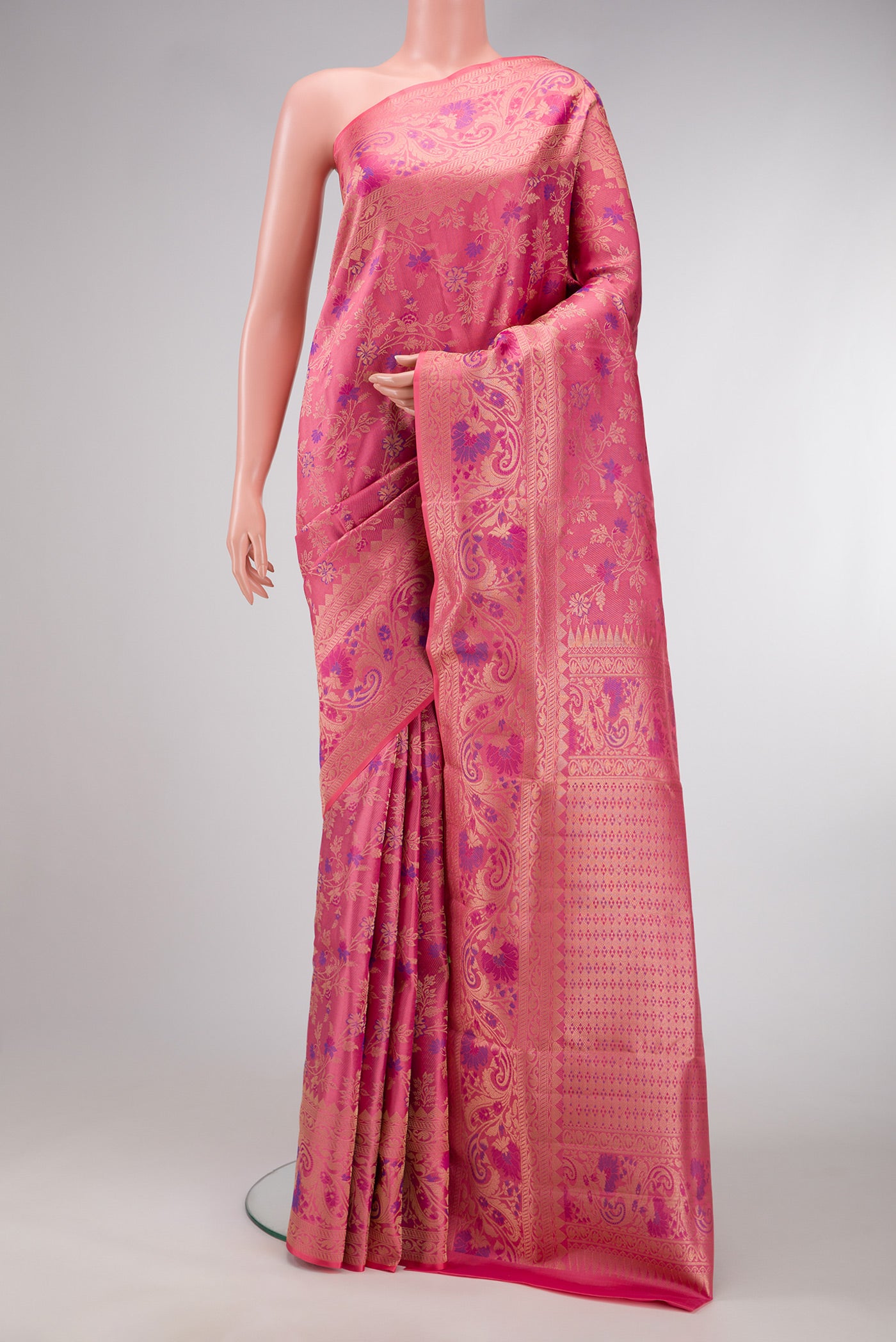Pink Dual Tone Kanchipuram Tissue Silk Saree with Zari Brocade on the body and Fancy Border.  displayed on a mannequin