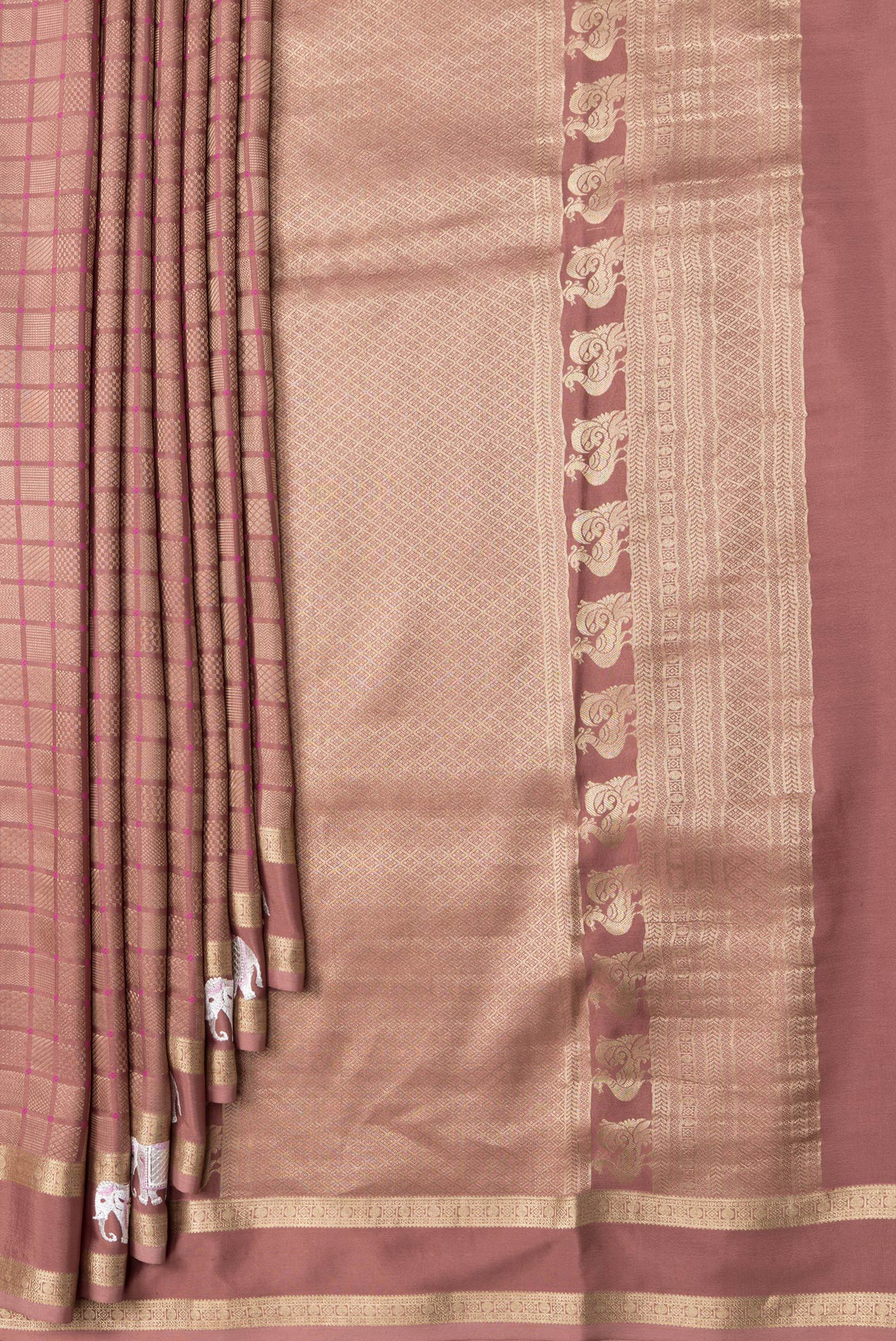 Pleats and pallu of Brown Dual Tone Mysore Silk Saree with Zari Brocade on the body and Embroidery Border. 