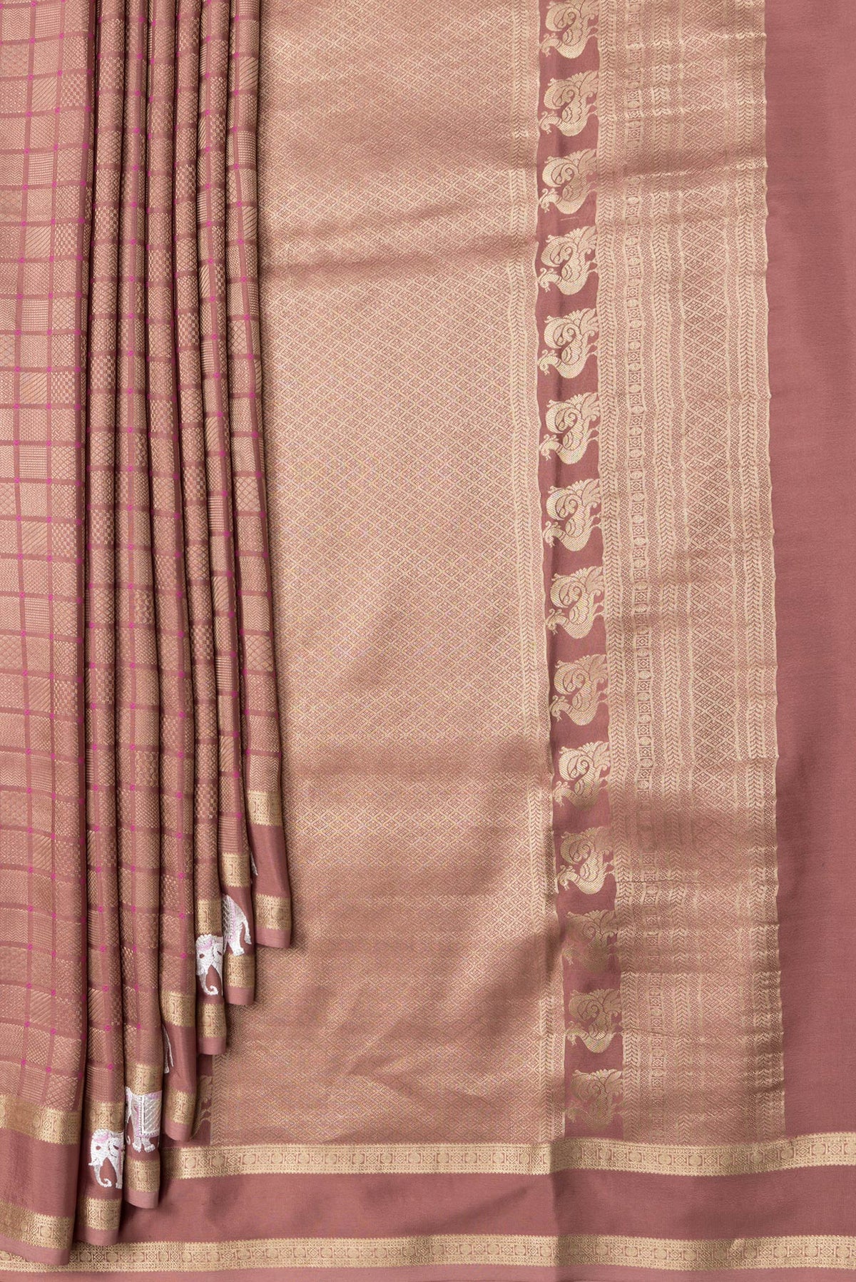 Pleats and pallu of Brown Dual Tone Mysore Silk Saree with Zari Brocade on the body and Embroidery Border. 