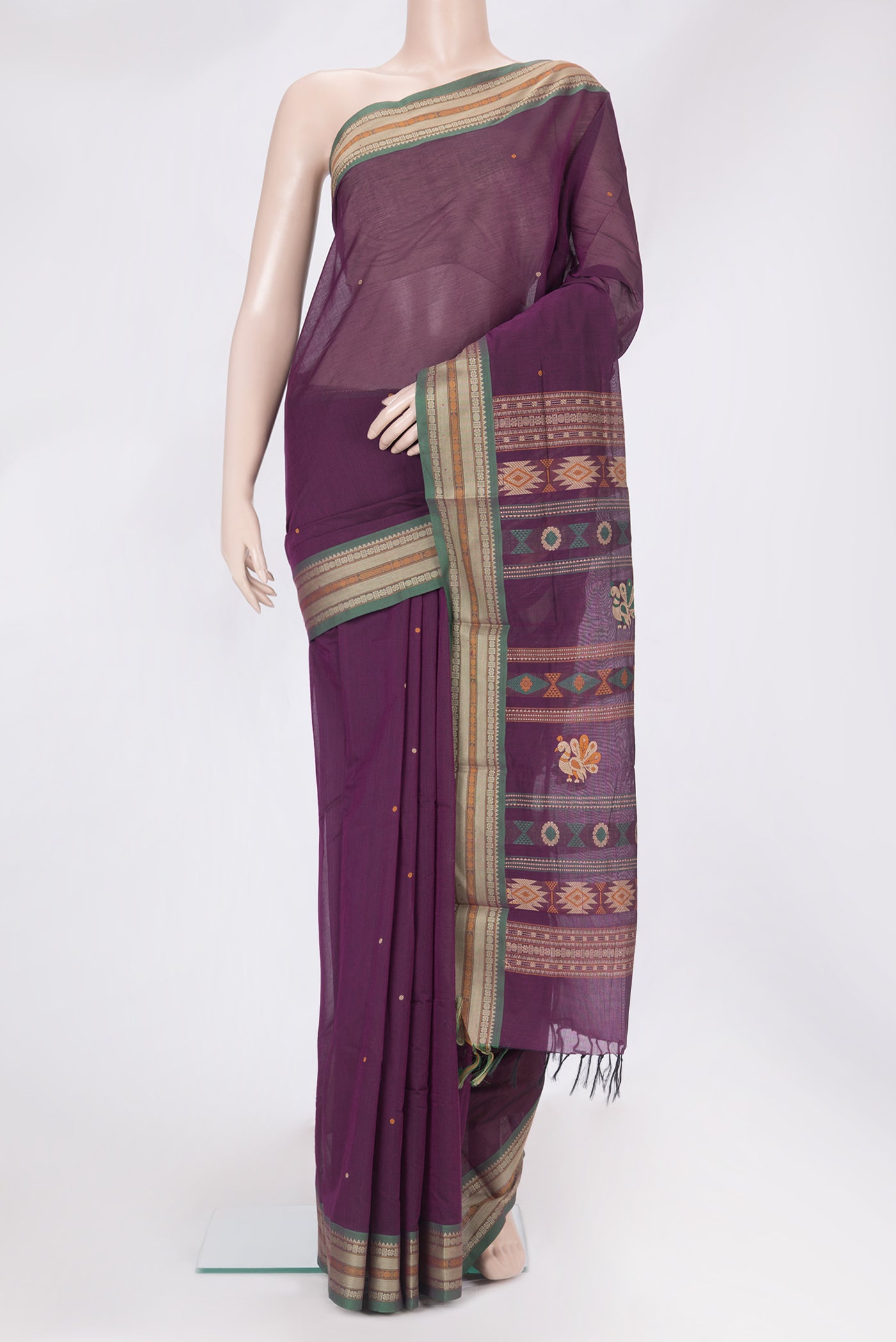 Purple Kanchi Cotton Saree with Thread Butta on the body and Thread Border.  displayed on a mannequin