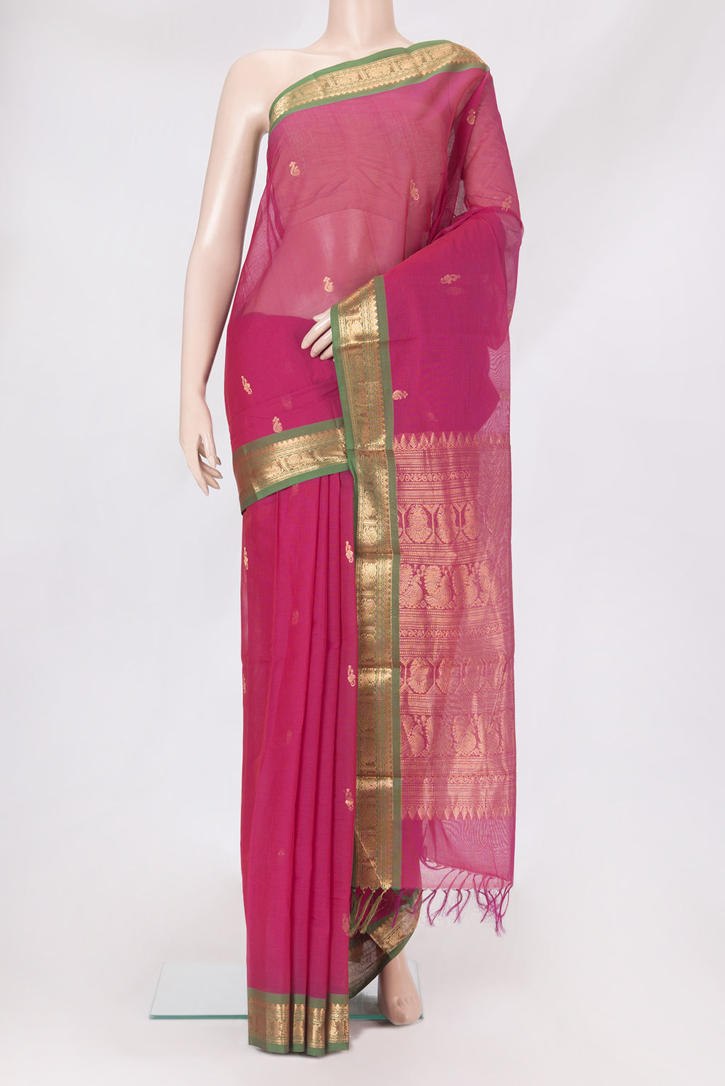 Pink Kanchi Cotton Saree with Zari Butta on the body and Zari Border.  displayed on a mannequin
