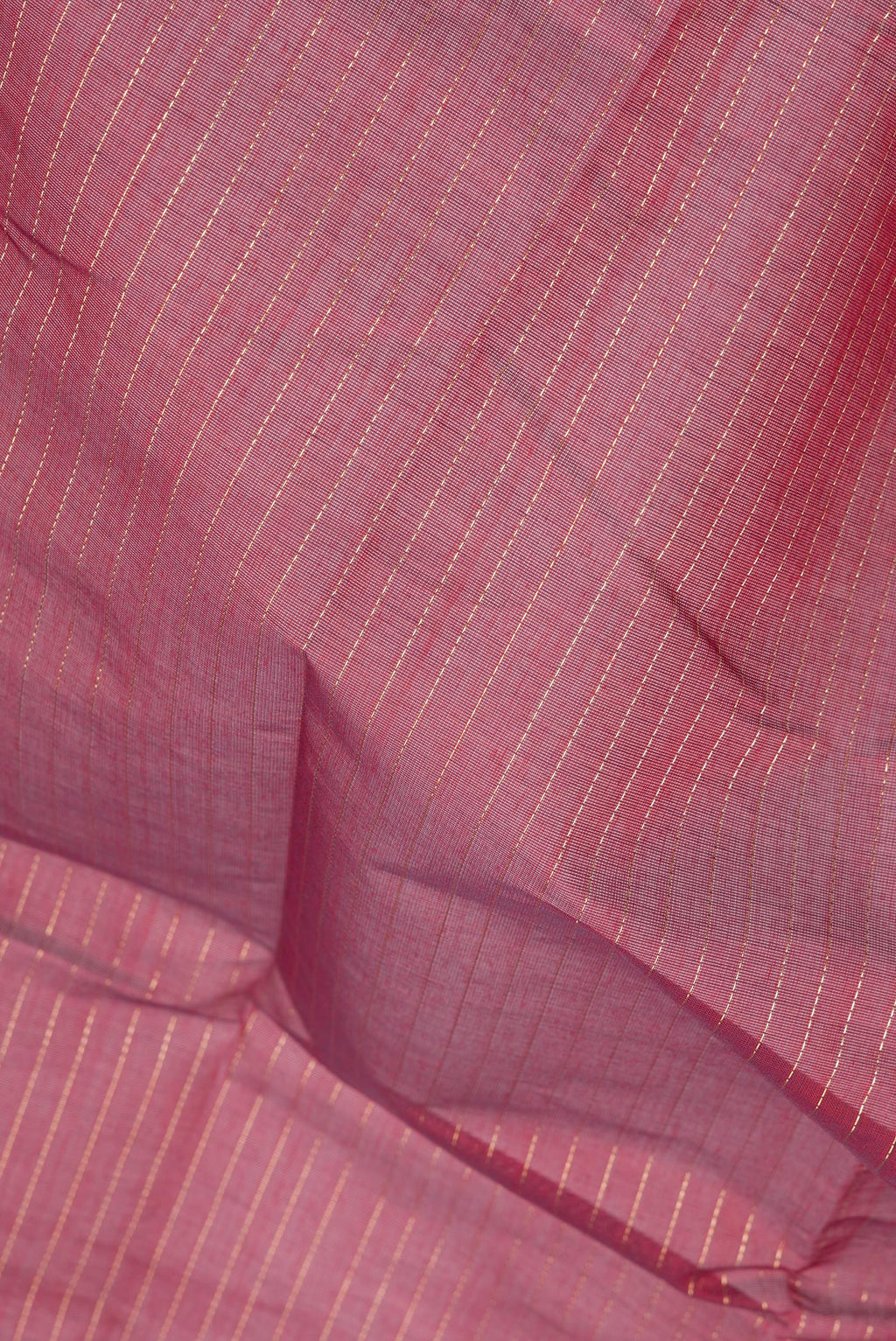 Close up of Maroon Kanchi Cotton Saree with Stripes on the body and Zari Border.  displaying folds