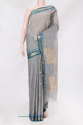 Grey Kanchi Cotton Saree with Zari Butta on the body and Temple Border.  displayed on a mannequin