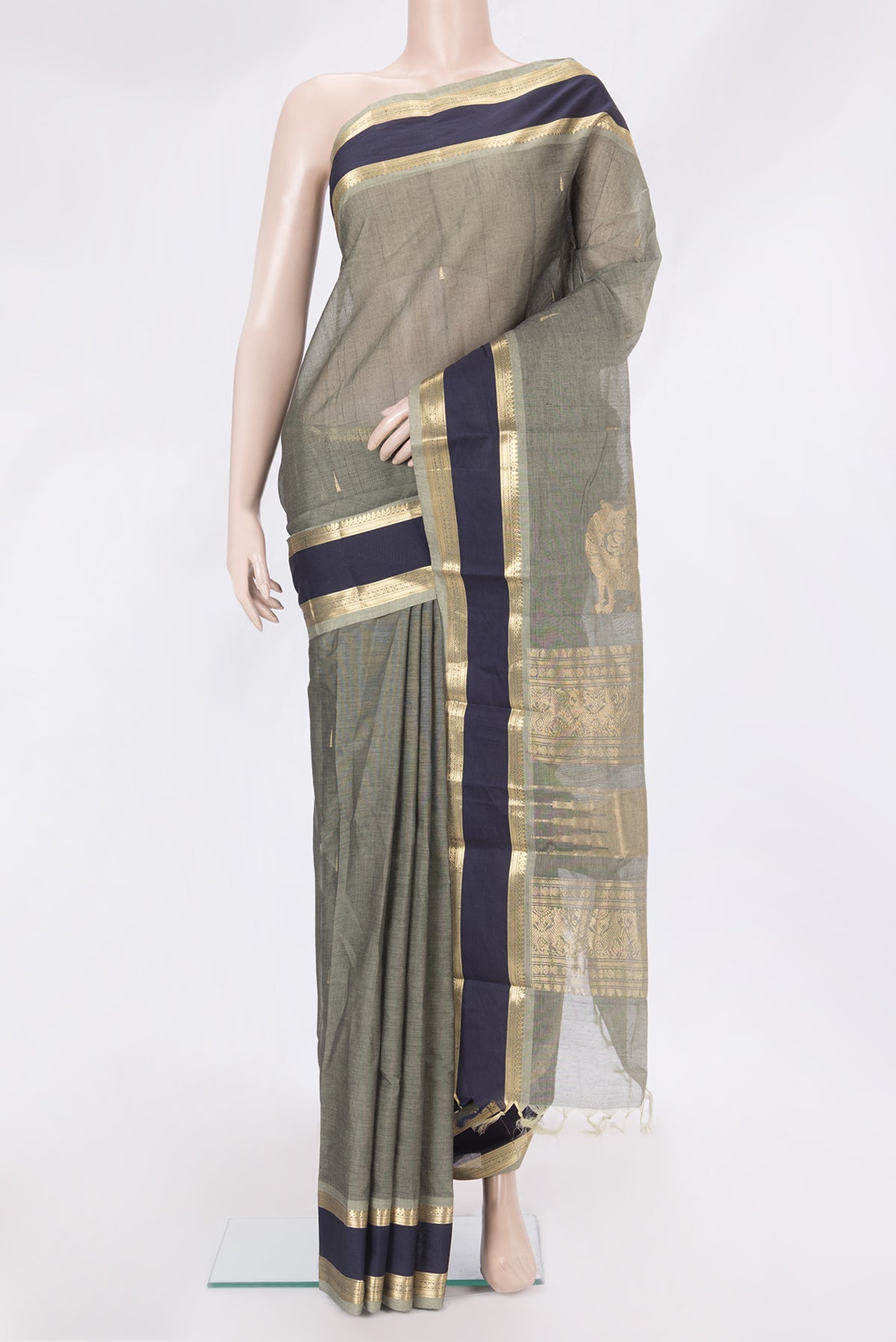 Grey Kanchi Cotton Saree with Zari Butta on the body and Zari Border.  displayed on a mannequin