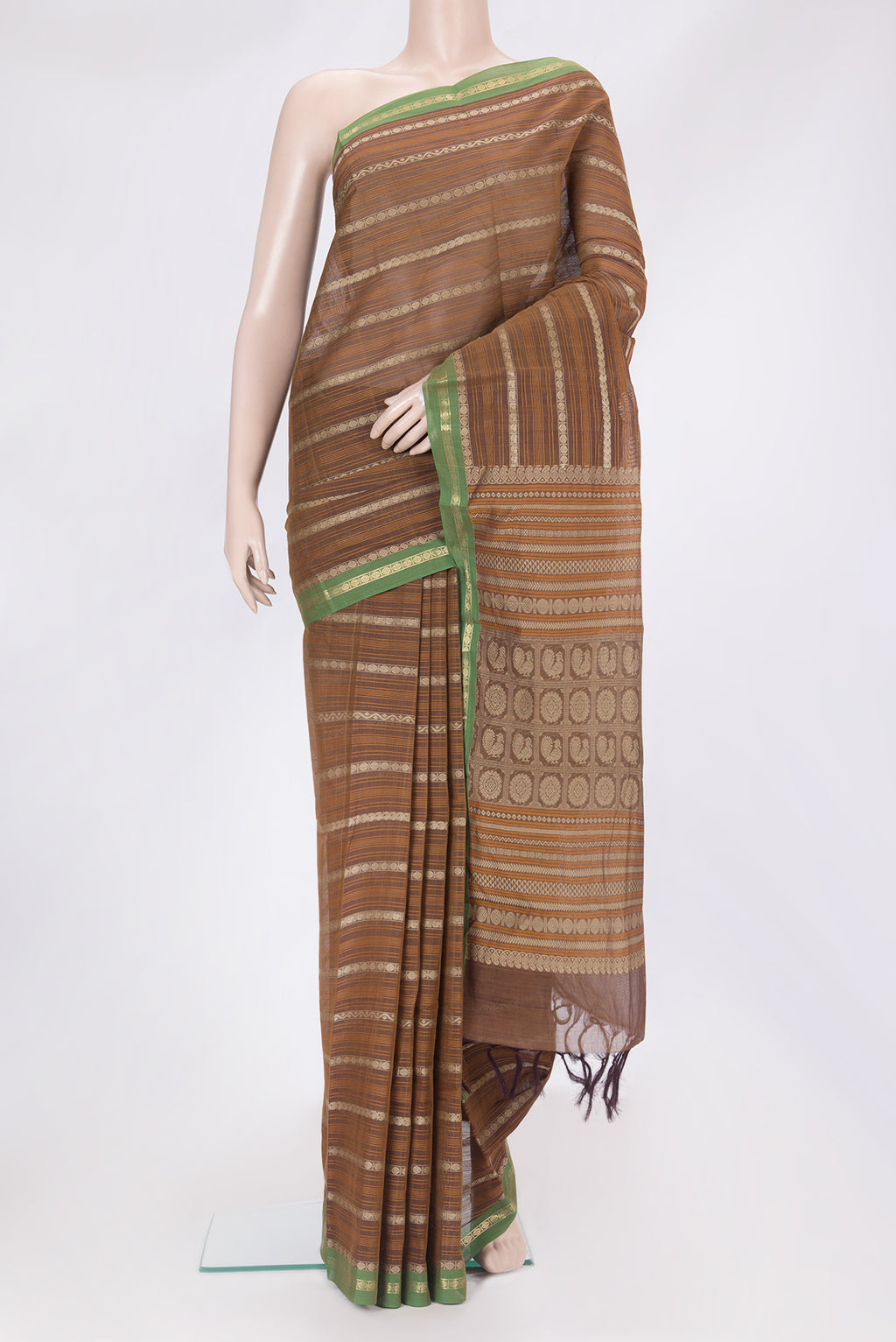 Brown Kanchi Cotton Saree with Stripes on the body and Zari Border.  displayed on a mannequin