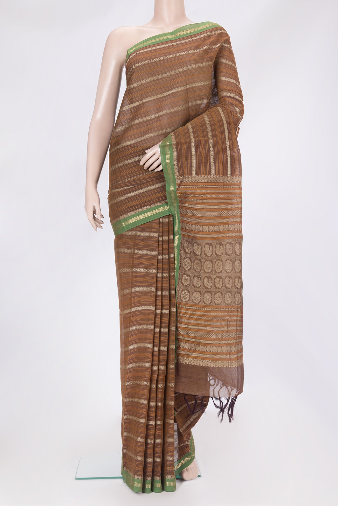 Brown Kanchi Cotton Saree with Stripes on the body and Zari Border.  displayed on a mannequin