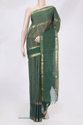 Bottle Green Kanchi Cotton Saree with Checked design on the body and Zari Border.  displayed on a mannequin