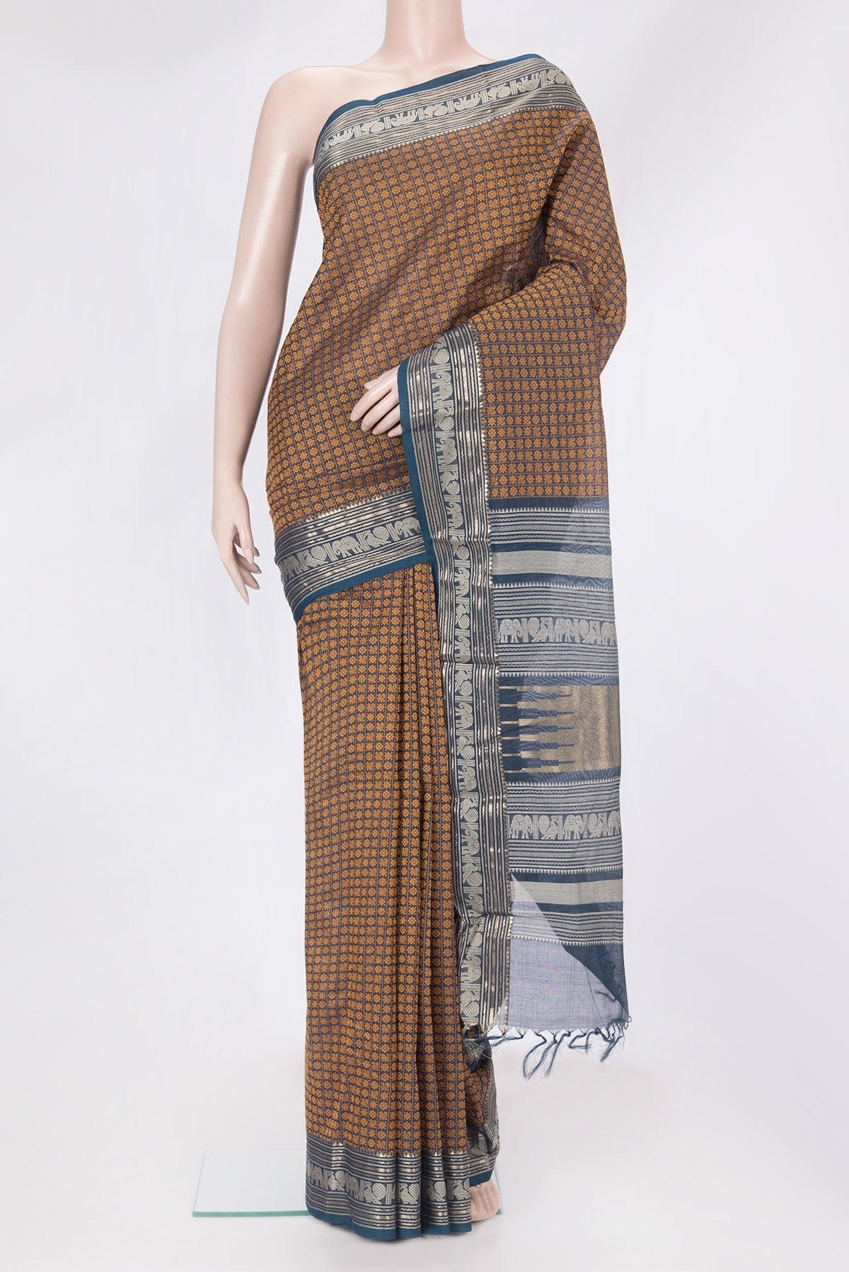 Navy Blue Dual Tone Kanchi Cotton Saree with Thread Butta on the body and Zari And Thread Border.  displayed on a mannequin
