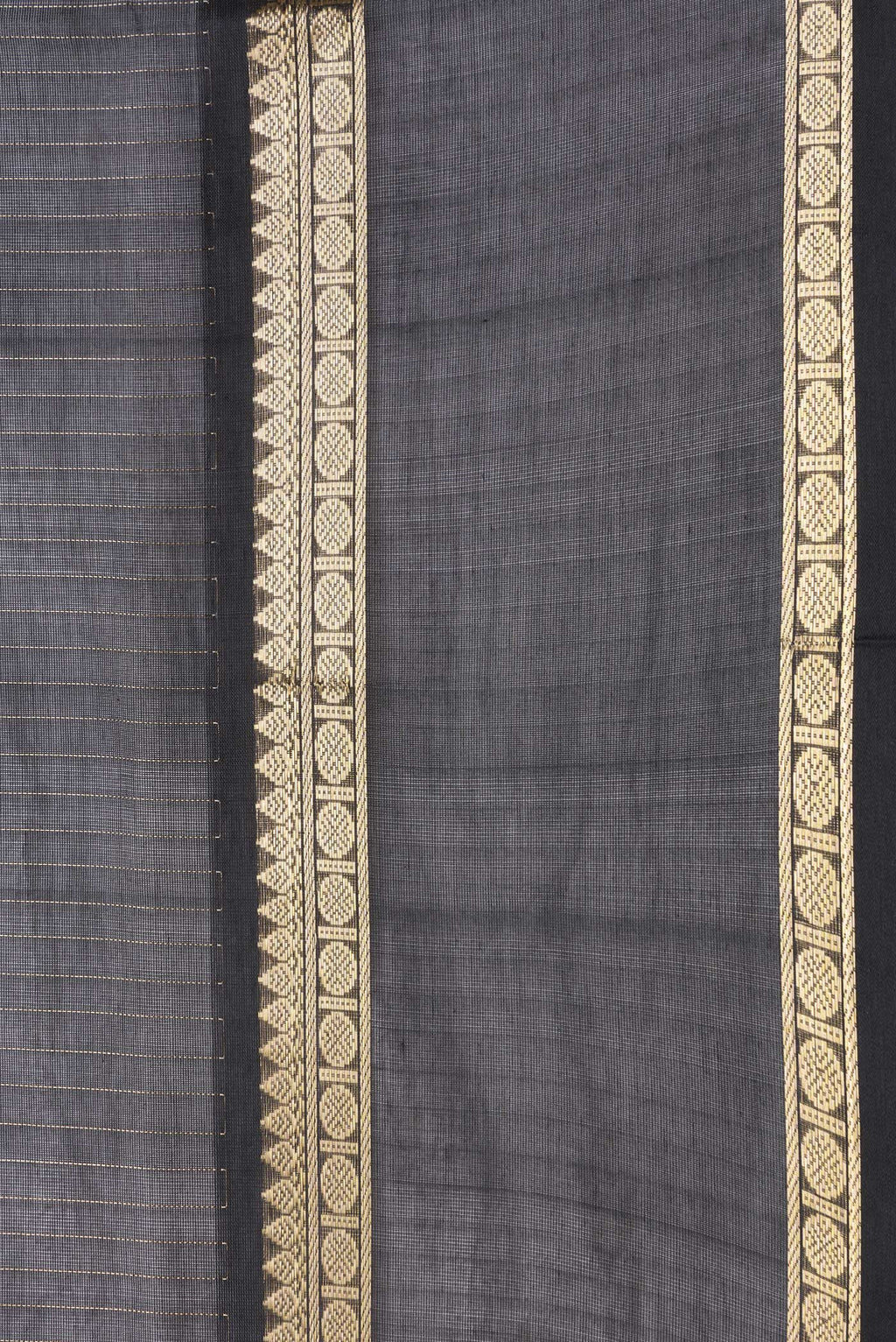Border image of Black Dual Tone Silk Cotton Saree with Stripes on the body and Zari Border. 