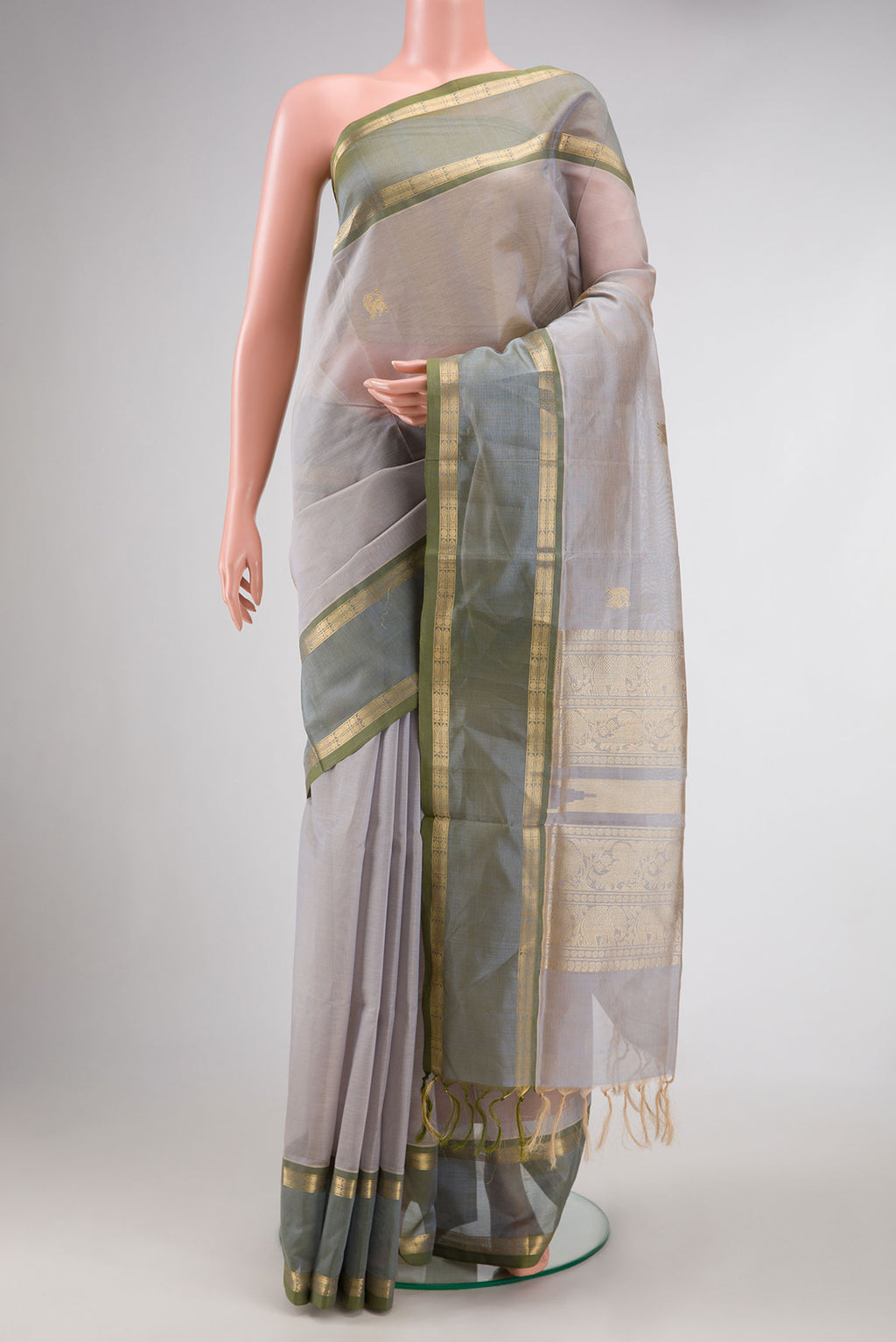 Grey Dual Tone Silk Cotton Saree with Zari Butta on the body and Zari Border.  displayed on a mannequin