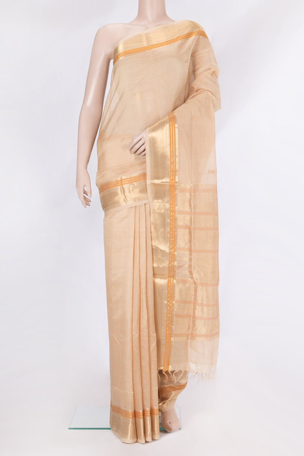 Sandal Dual Tone Silk Cotton Saree with Zari Butta on the body and Zari Border.  displayed on a mannequin