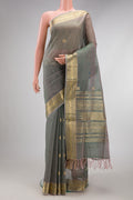 Grey with Green Color Silk Cotton Saree with Zari Butta on the body and Zari Border.  displayed on a mannequin