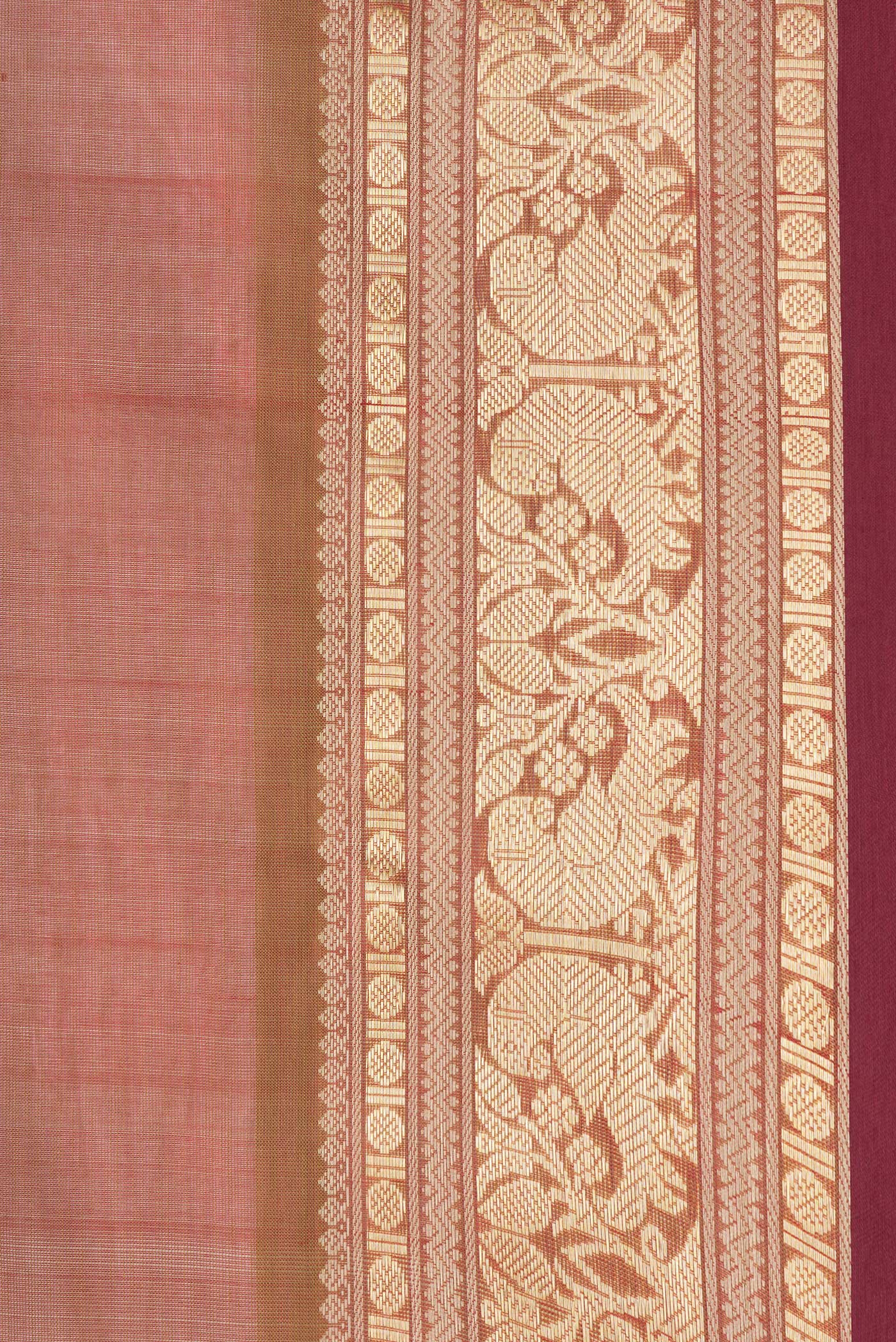 Border image of Maroon Dual Tone Silk Cotton Saree with Zari Butta on the body and Zari Border. 