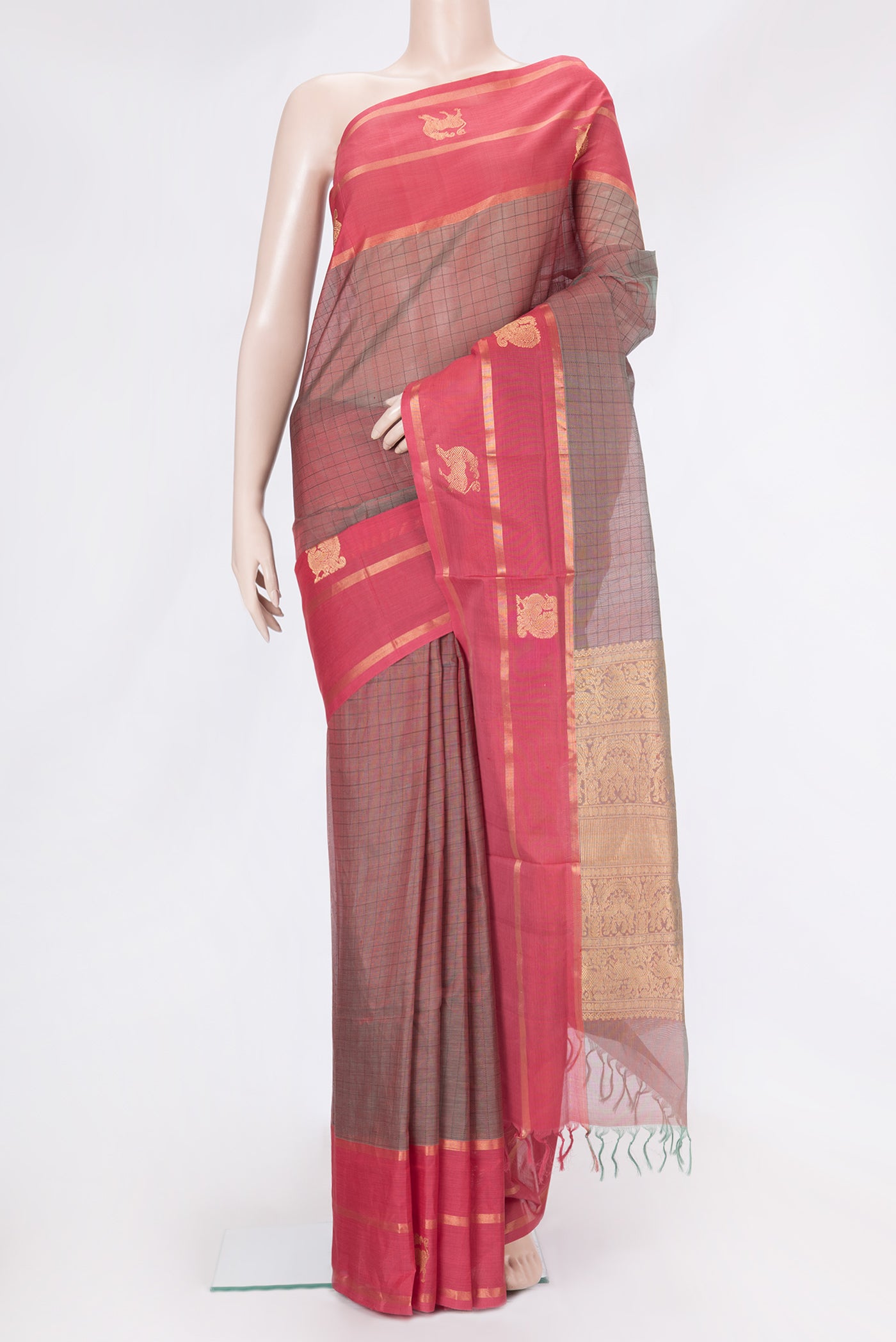 Mehandi Green Dual Tone Silk Cotton Saree with Checked design on the body and Fancy Border.  displayed on a mannequin