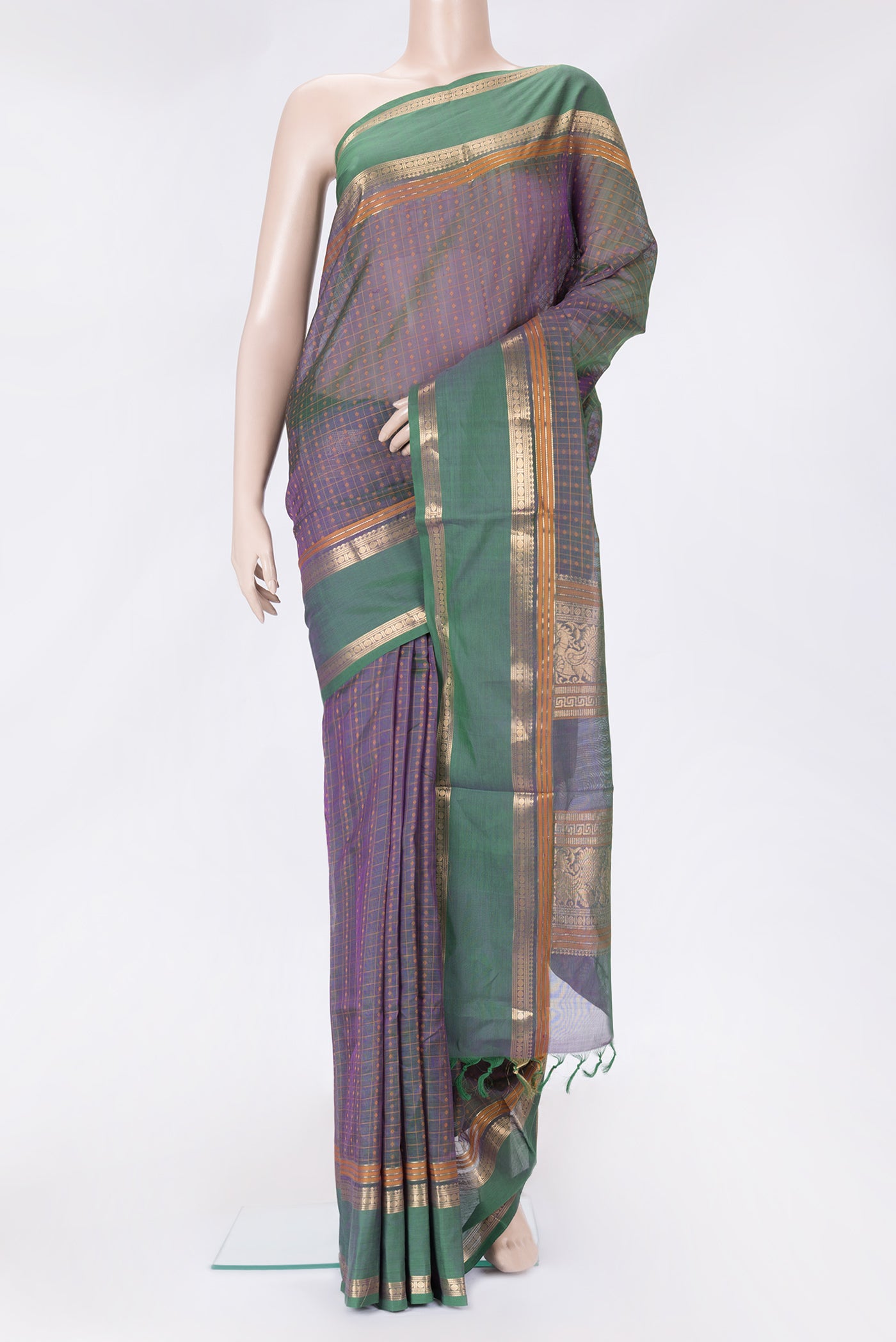 Green Dual Tone Silk Cotton Saree with Thread Butta on the body and Zari Border.  displayed on a mannequin