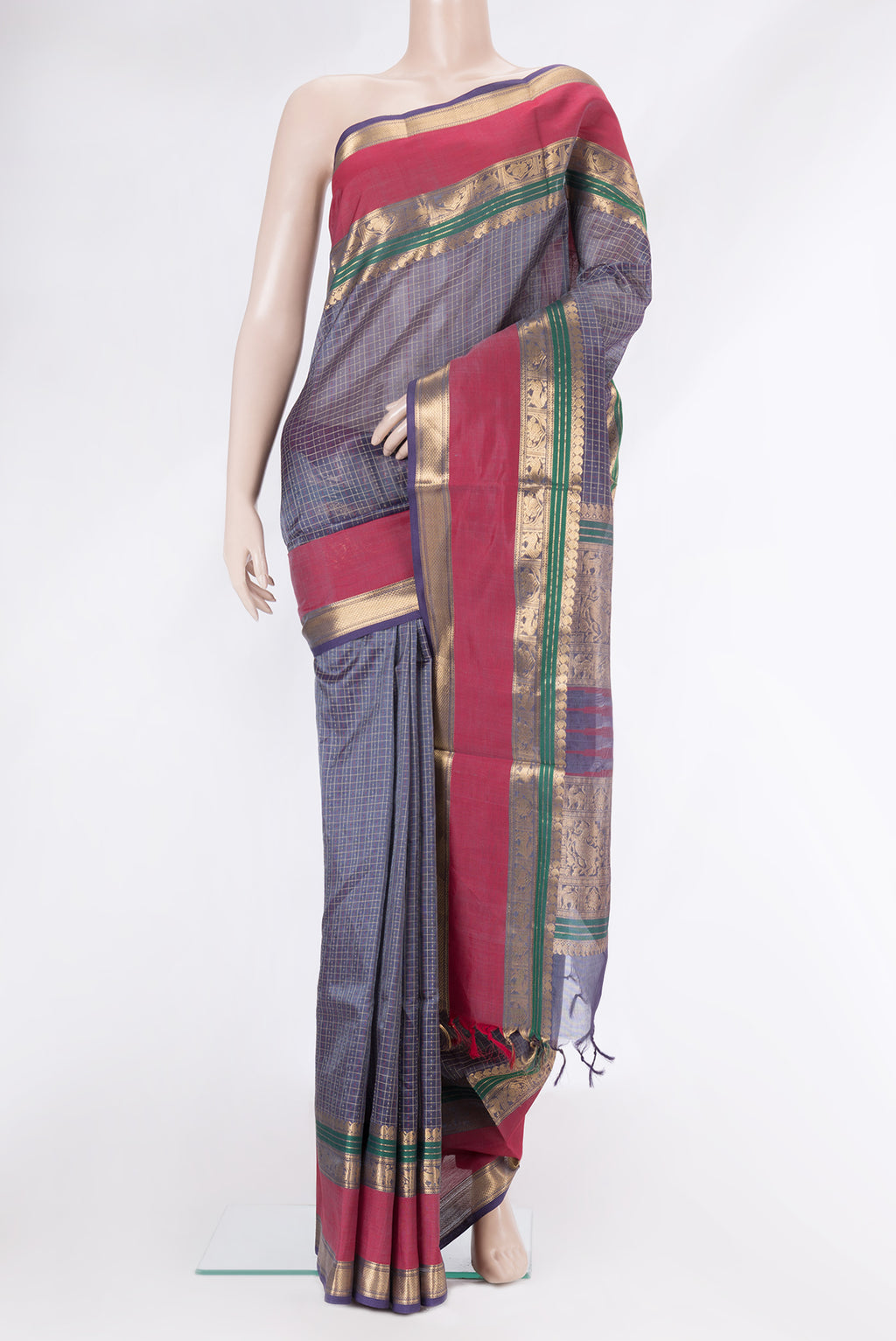 Grey Silk Cotton Saree with Checked design on the body and Zari Border.  displayed on a mannequin