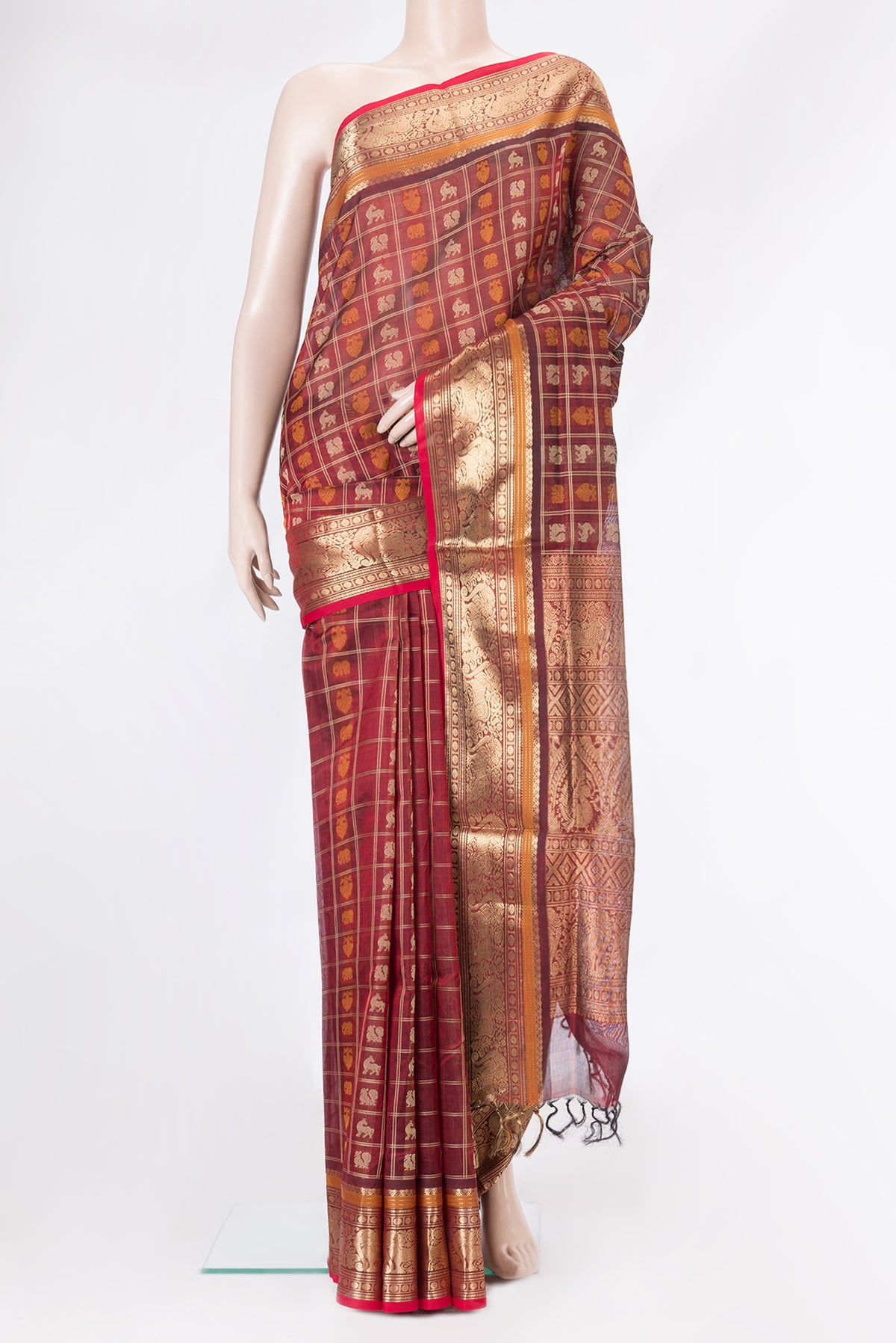 Maroon Dual Tone Silk Cotton Saree with Checked design on the body and Zari Border.  displayed on a mannequin