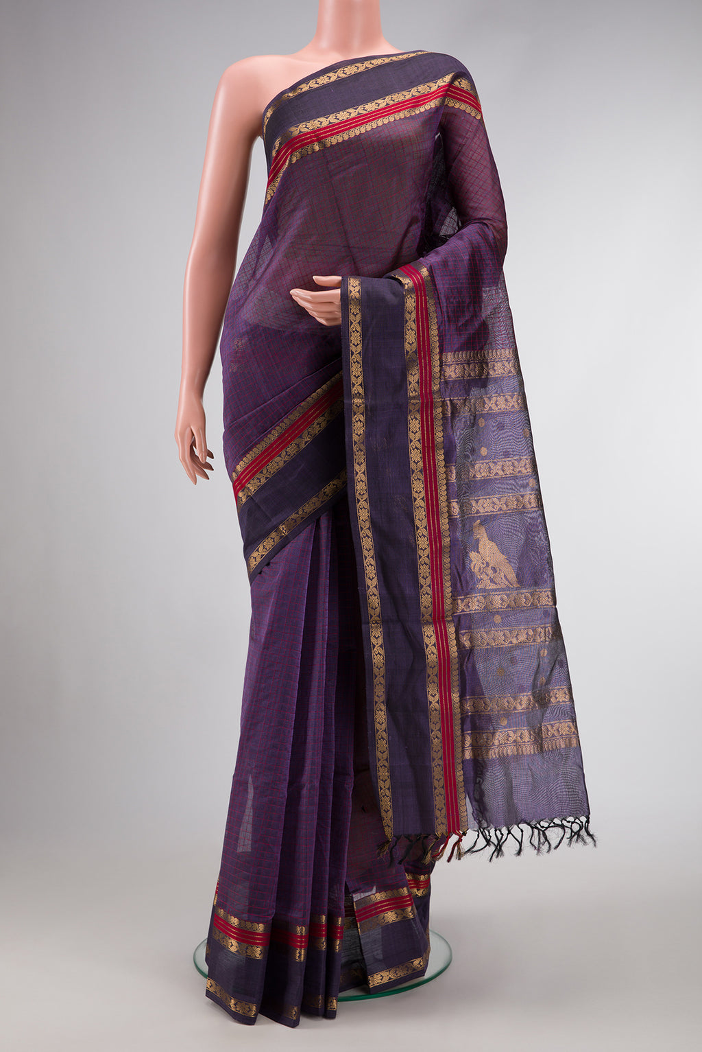 Violet Dual Tone Silk Cotton Saree with Checked design on the body and Zari Border.  displayed on a mannequin