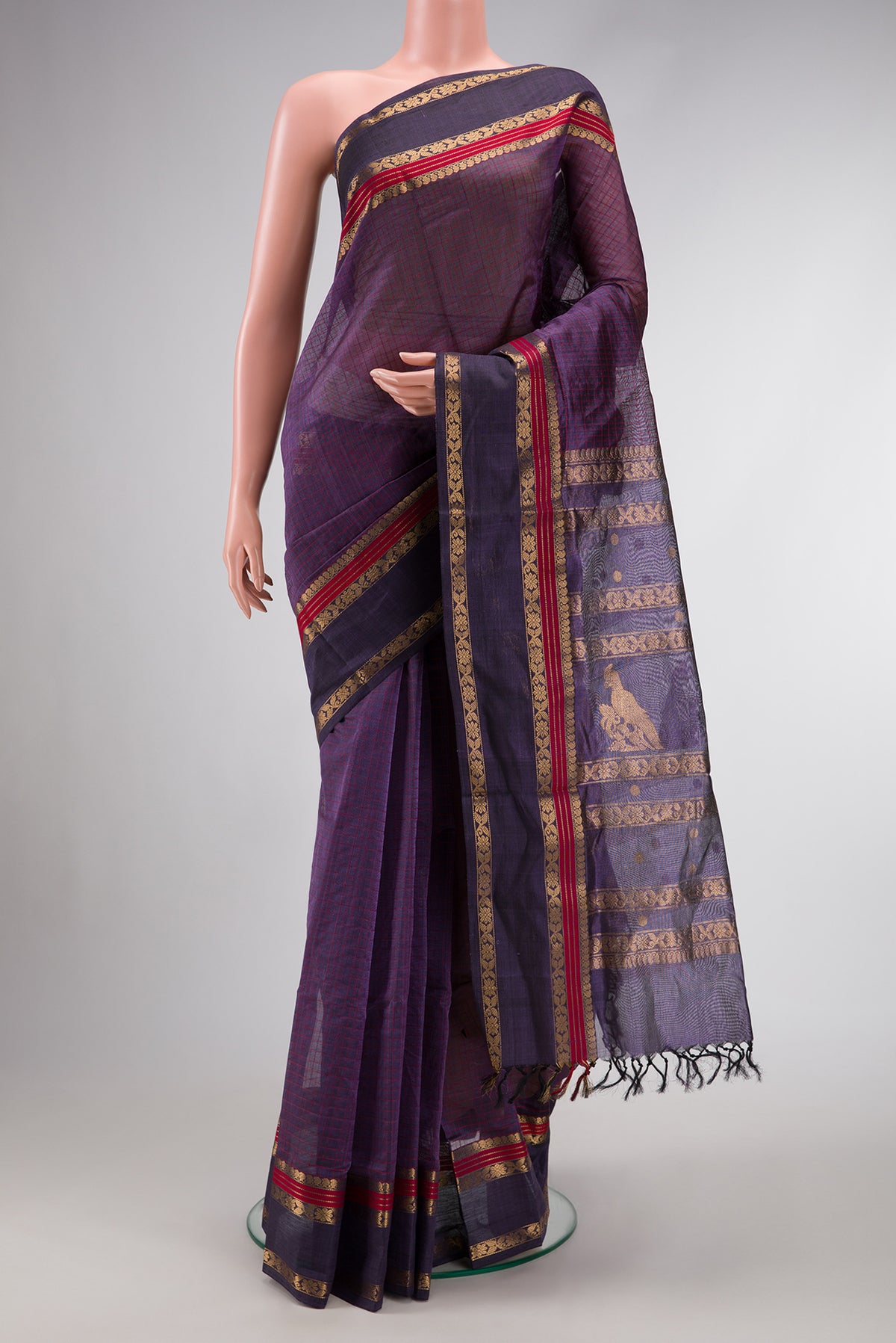 Violet Dual Tone Silk Cotton Saree with Checked design on the body and Zari Border.  displayed on a mannequin