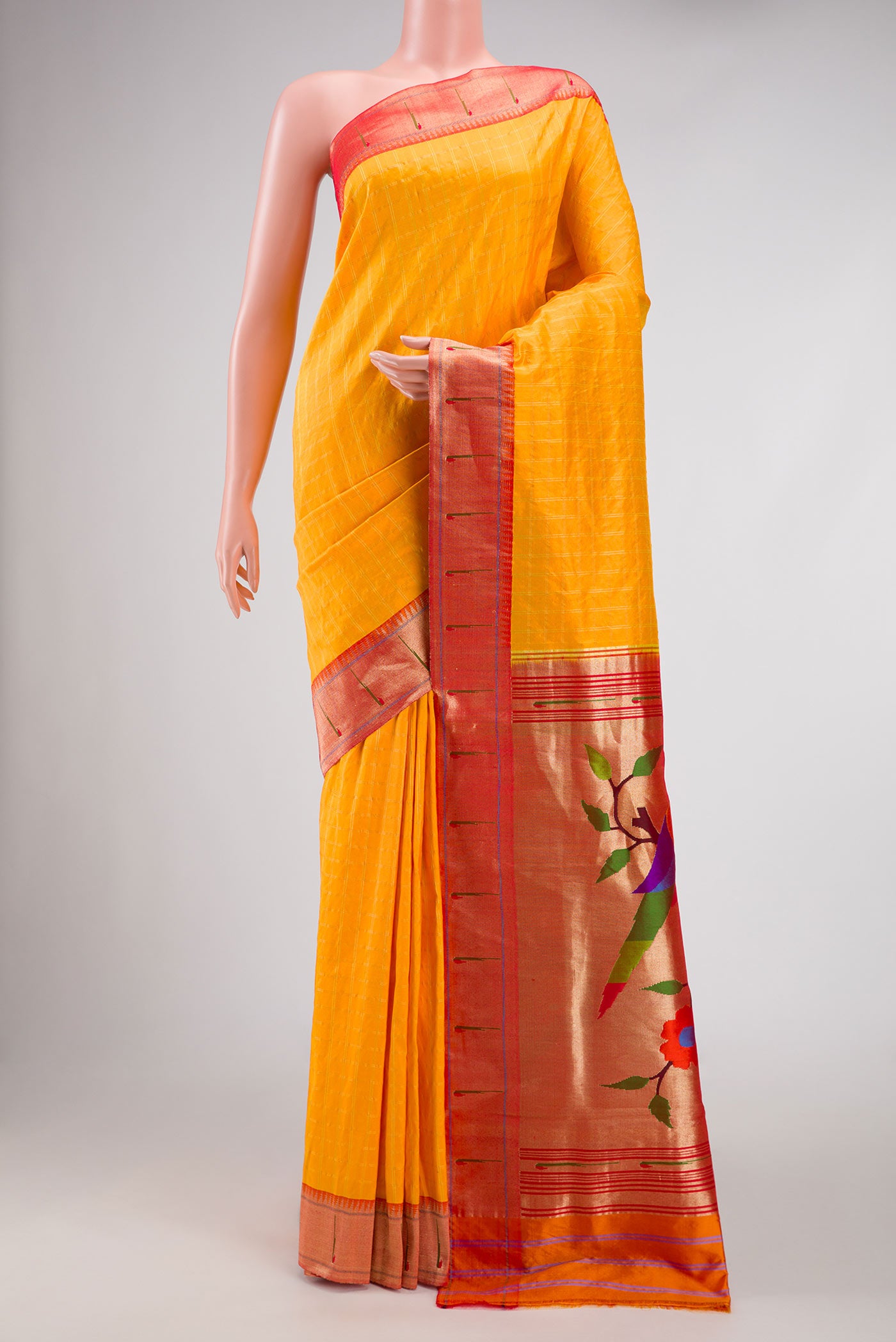 Yellow Dual Tone Paithani Silk Saree with Checked design on the body and Paithani Border displayed on a mannequin