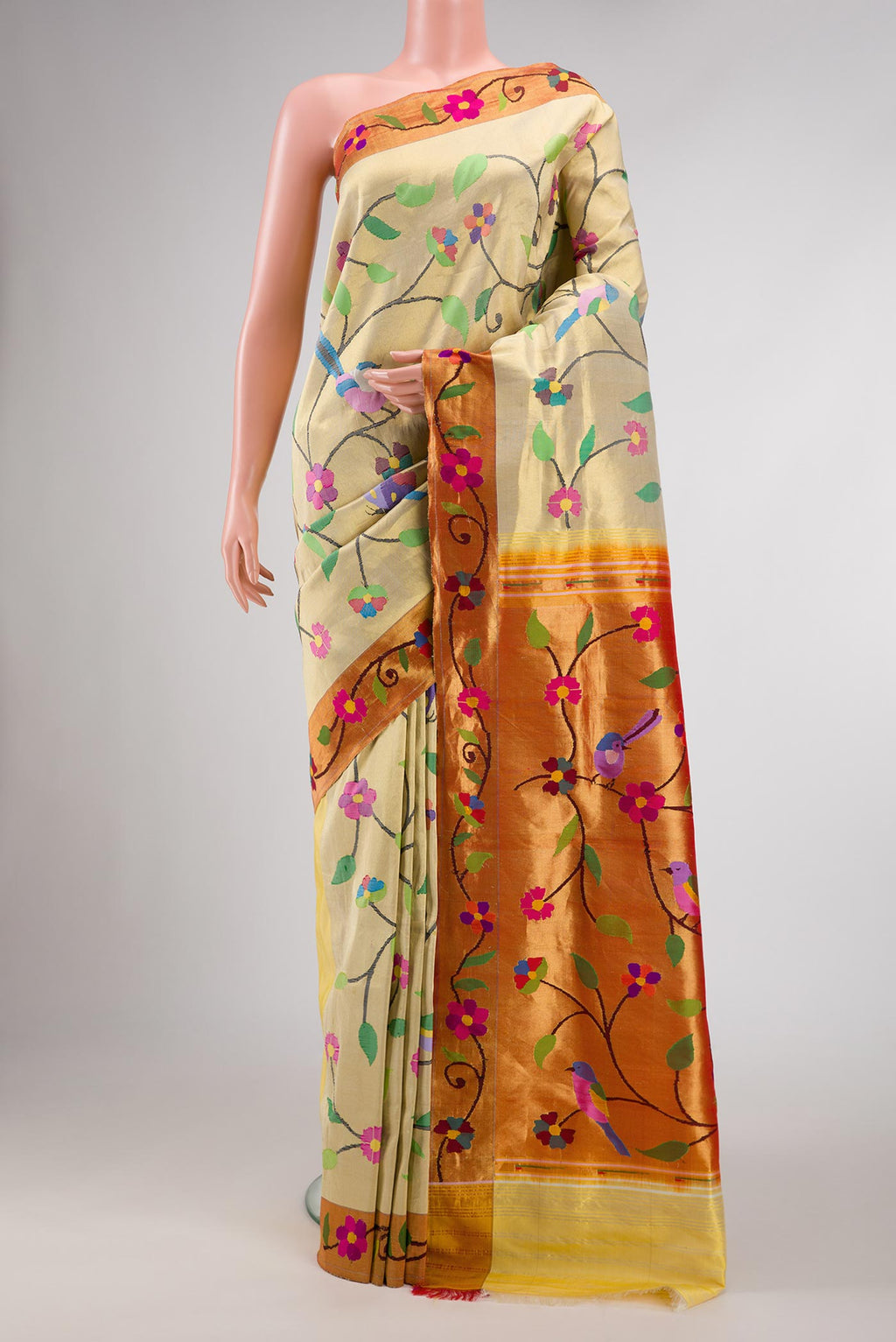 Pure Silk Pure Zari Gold Dual Tone Paithani Saree with Zari Brocade on the body and Paithani Border displayed on a mannequin