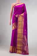 Pure Silk Pure Zari Purple Dual Tone Kanjivaram Saree with Zari Butta on the body and Zari Border.  displayed on a mannequin