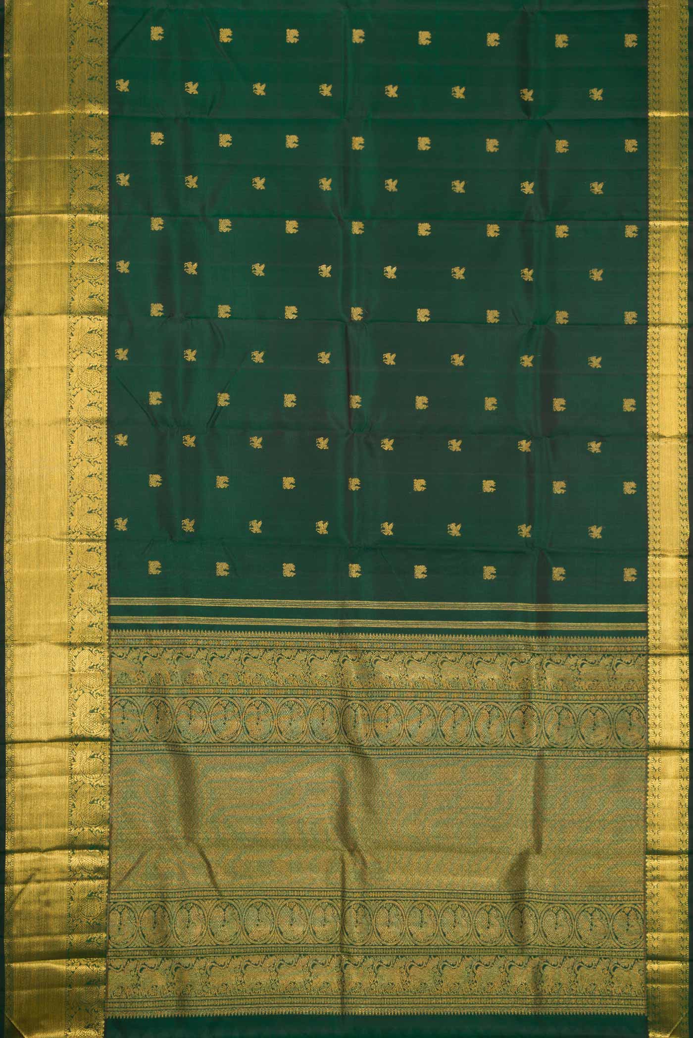 Flat view of Pure Silk Pure Zari Bottle Green Dual Tone Kanjivaram Saree with Zari Butta on the body and Zari Border. 
