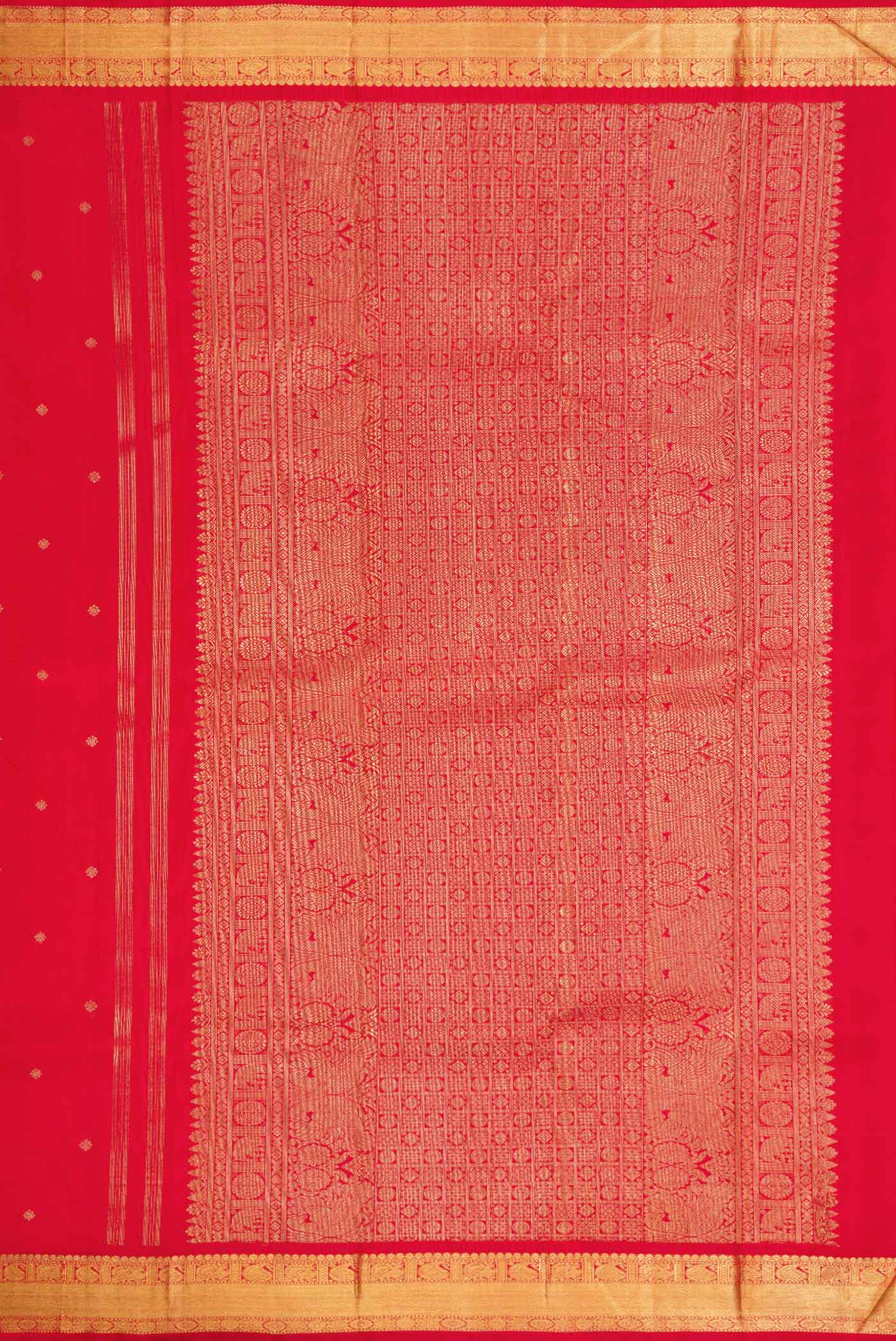 Close up image of the pallu of Pure Silk Pure Zari Red Dual Tone Kanchipuram Saree with Zari Butta on the body and Zari Border. 