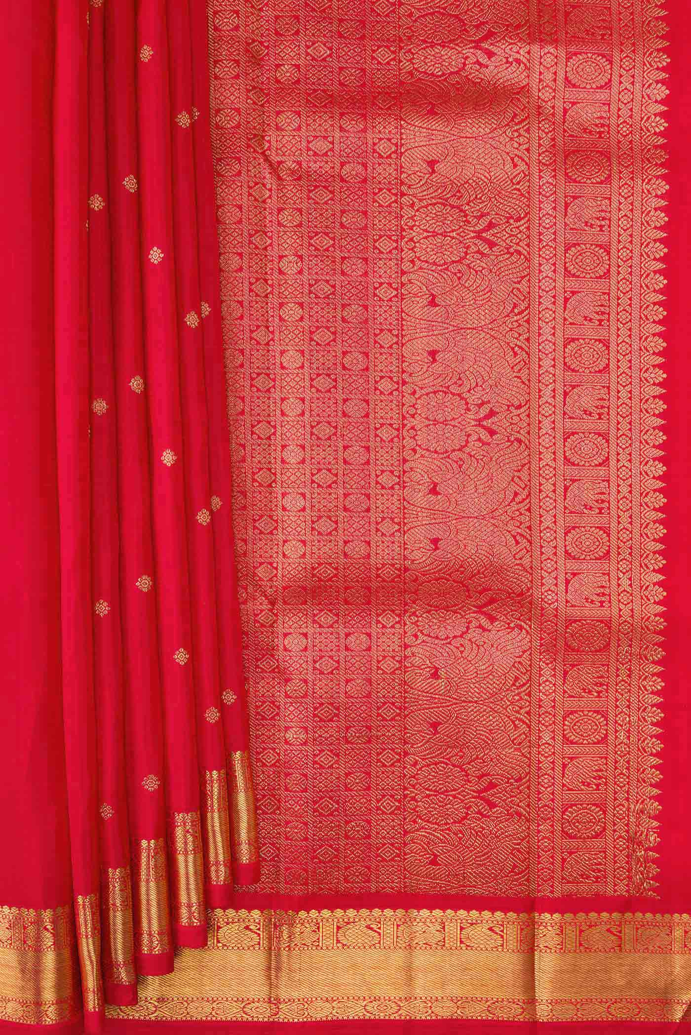 Pleats and pallu of Pure Silk Pure Zari Red Dual Tone Kanchipuram Saree with Zari Butta on the body and Zari Border. 