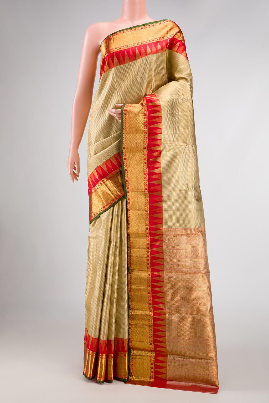 Pure Silk Pure Zari Gold Dual Tone Kanjivaram Tissue Saree with Zari Brocade on the body and Zari Border.  displayed on a mannequin